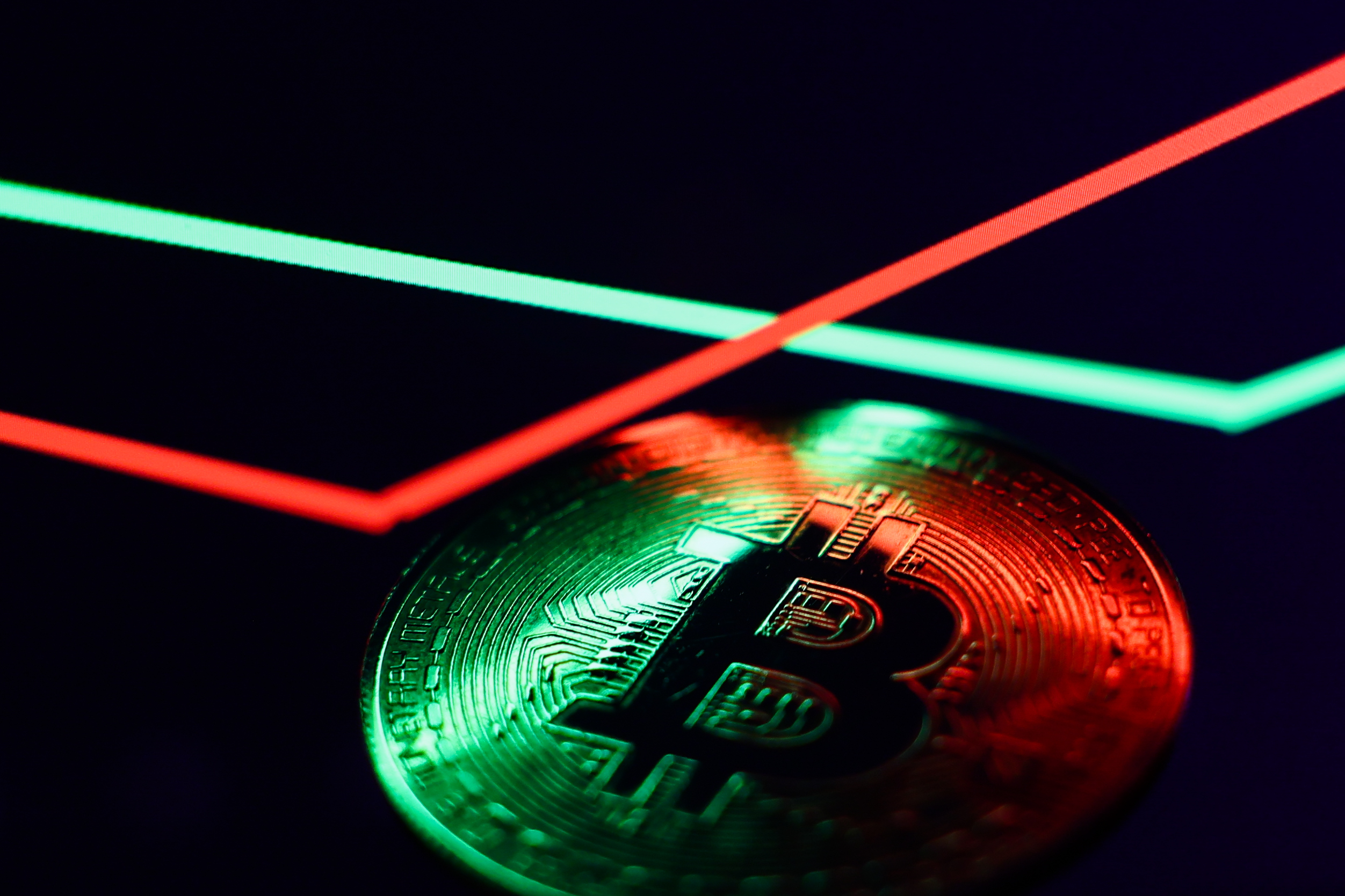 Bitcoin logo on price chart