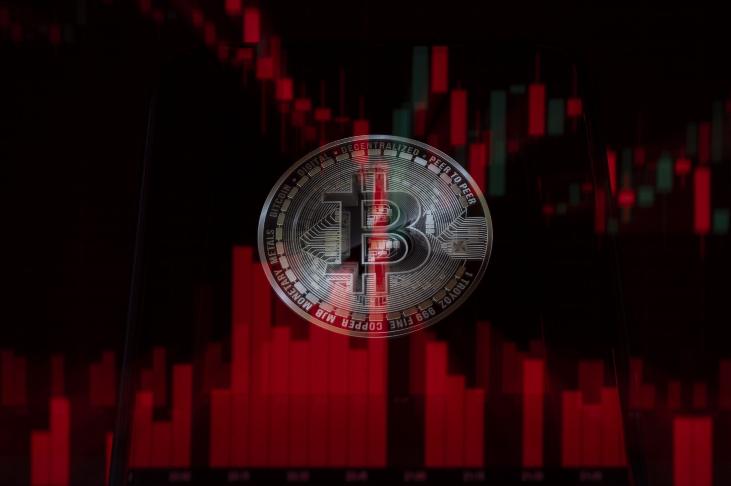 Bitcoin logo on price chart