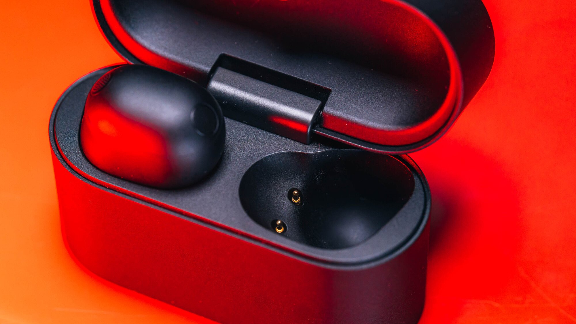 sony xm6 earbuds in charging case with top open