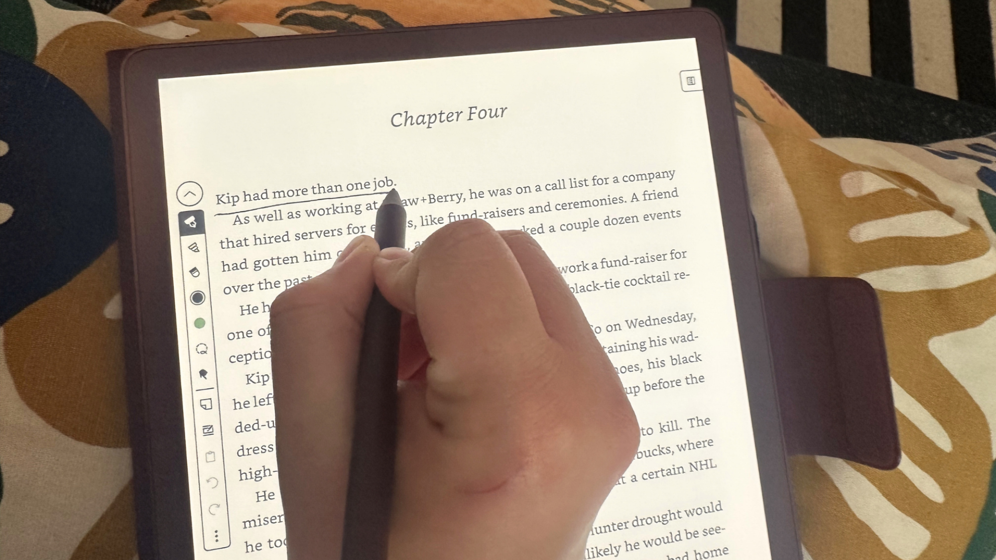 A person annotating on the Kindle Scribe Colorsoft