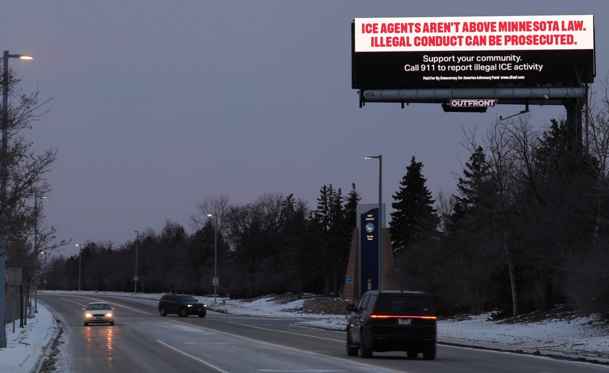 Activists run billboards that read "Ice agents aren't about Minnesota law. Illegal conduct can be prosecuted." 