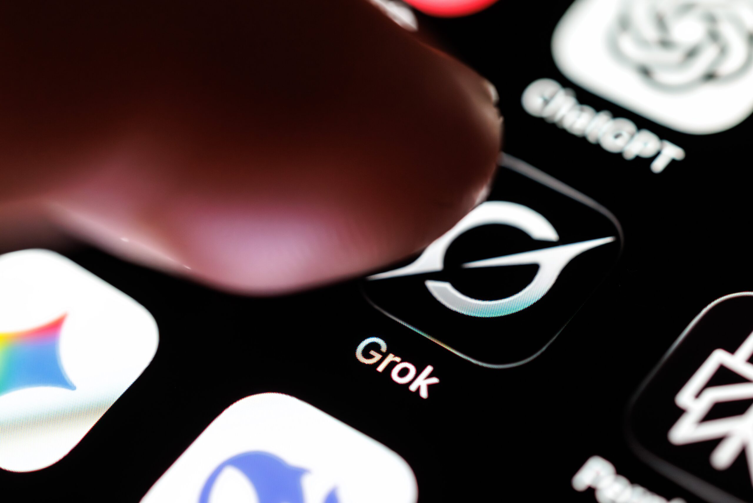 finger tapping grok app icon