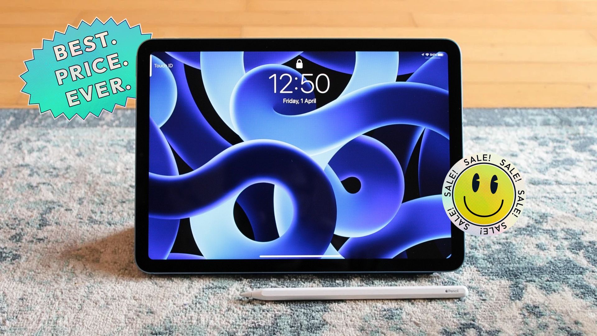 ipad air on carpet with apple pencil and stickers that read 'best price ever' and 'sale'