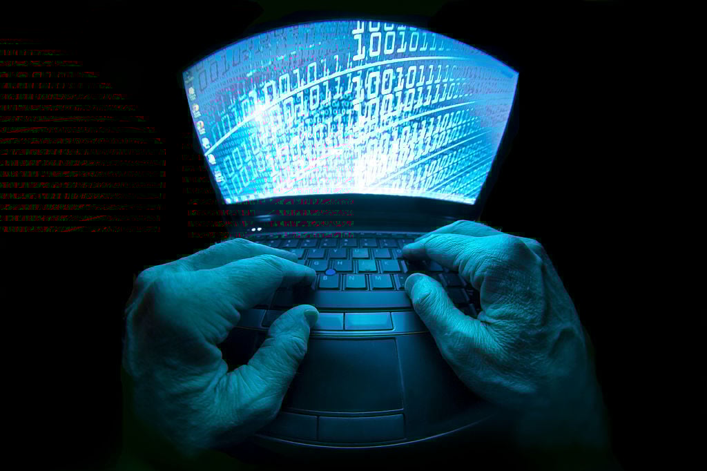 Fish-eye lens view of a computer screen with hacking stuff on it