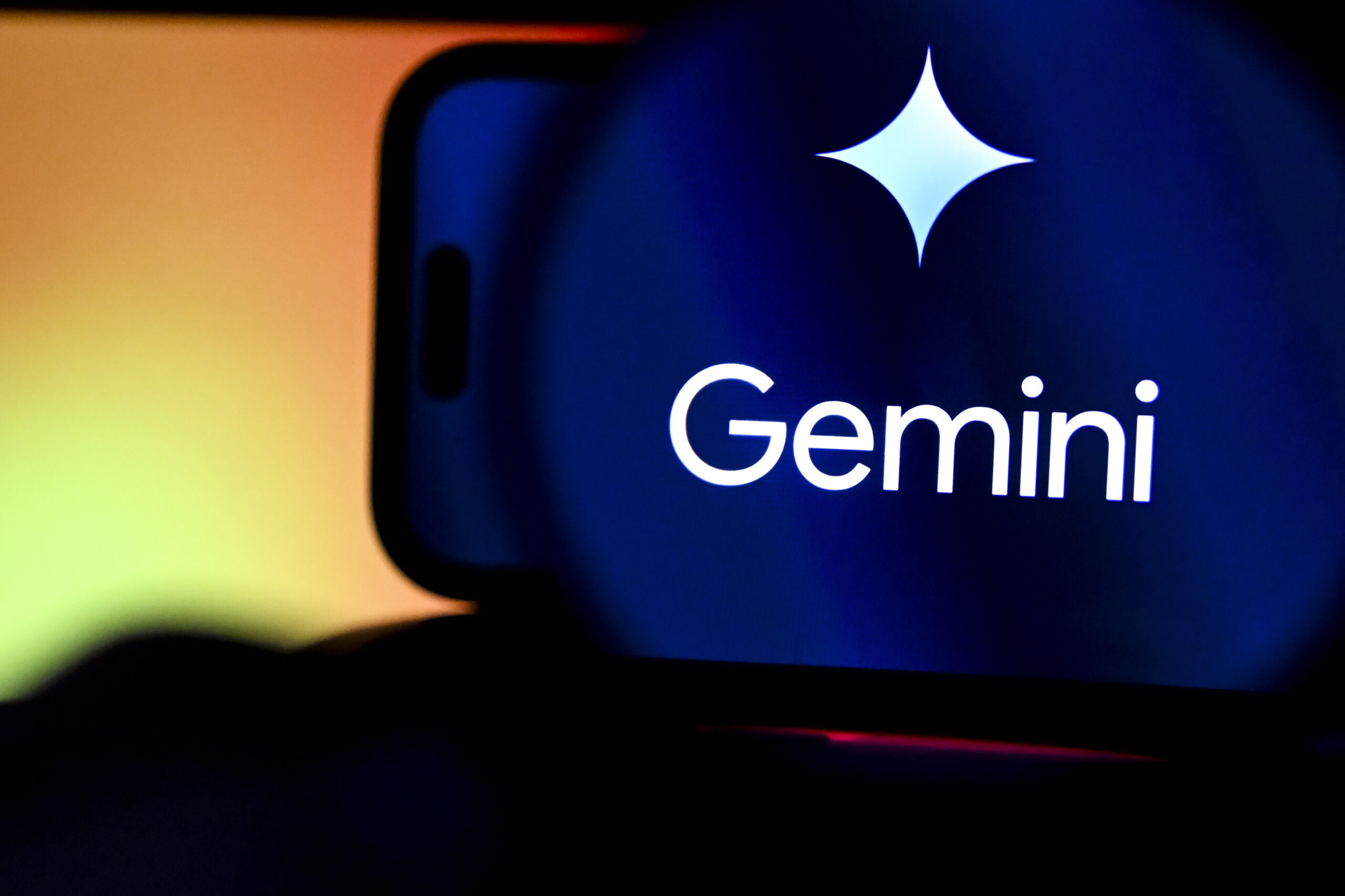 A phone screen shows the blue Gemini logo.