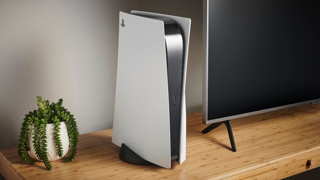 PlayStation 5 console next to TV