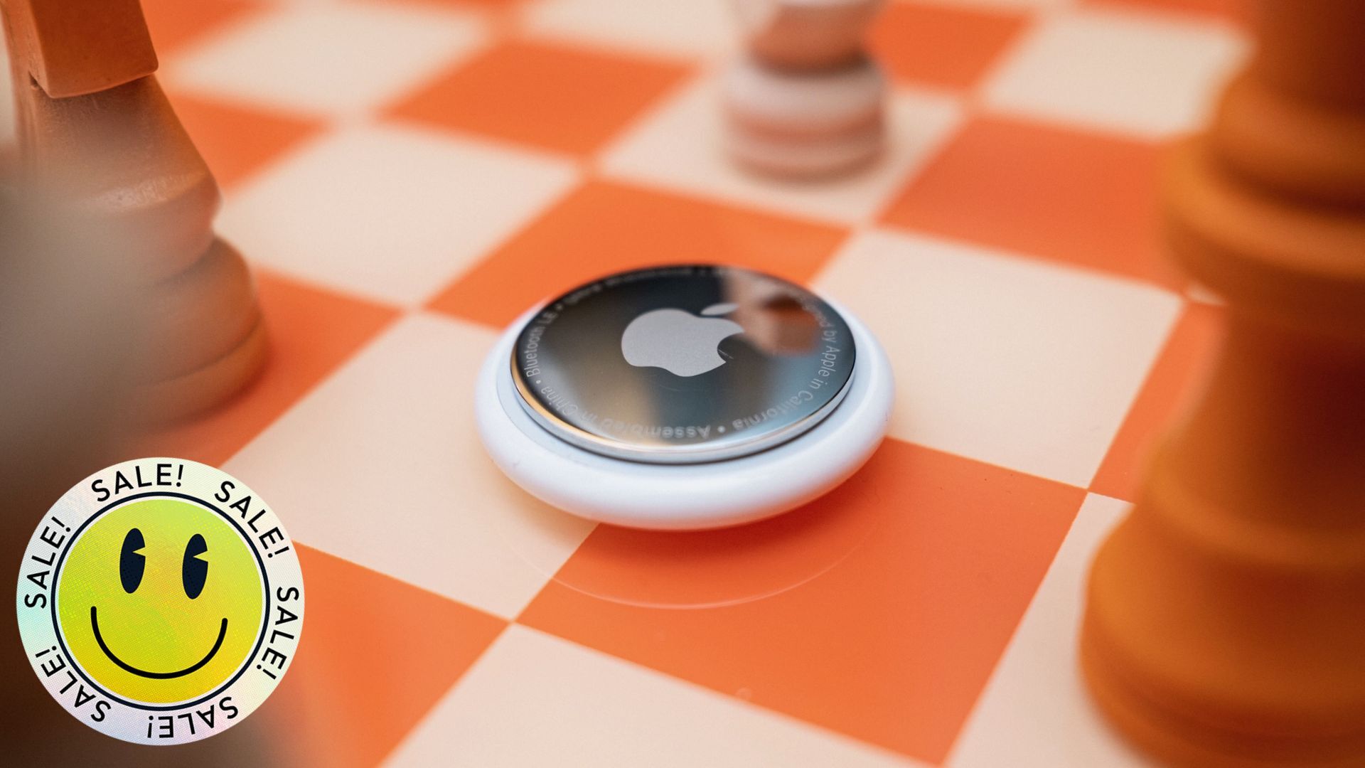 apple airtag on orange checker board