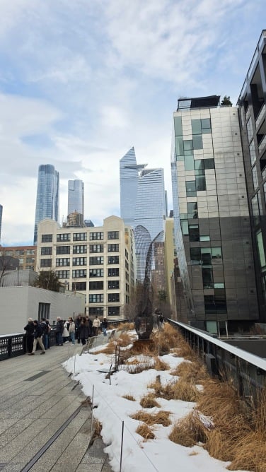 the highline in new york city with the edge in the background