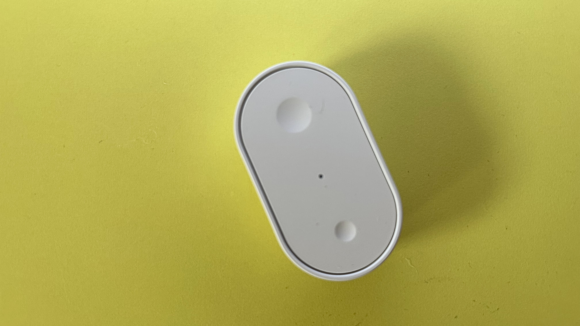 The remote for the IKEA Varmblixt lamp.