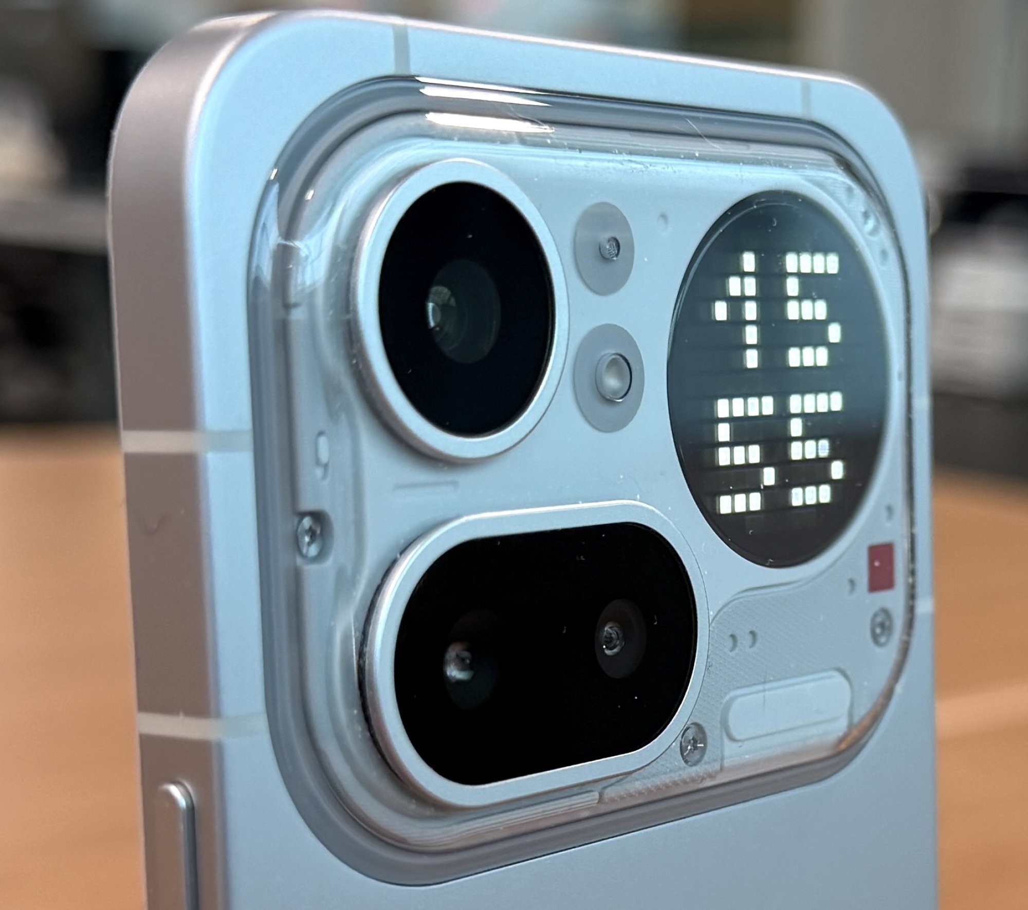 The back of the nothing phone, with three camera lenses