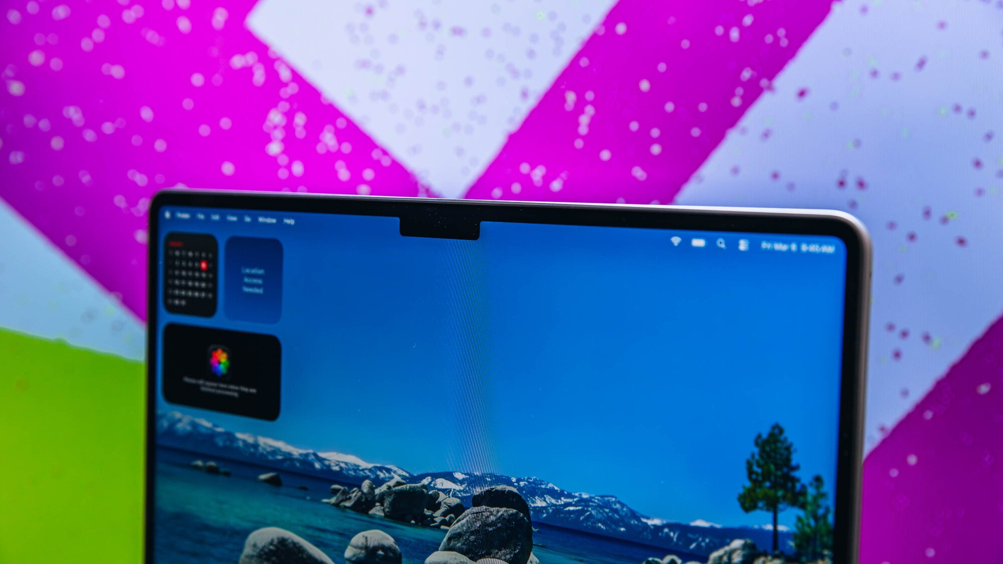 m5 macbook air display on stylized background