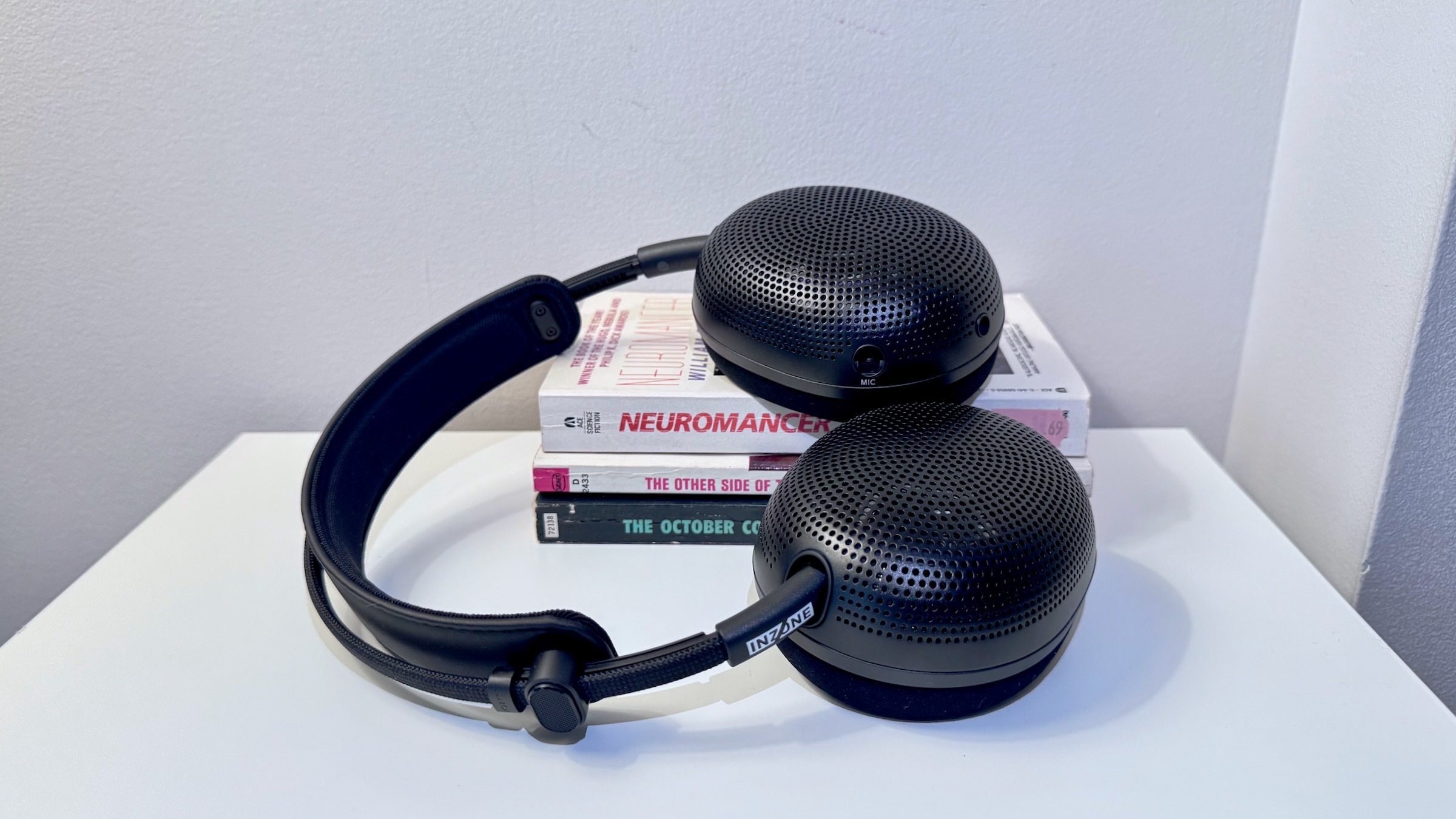 sony h6 air open-back gaming headset on a pile of science fiction books