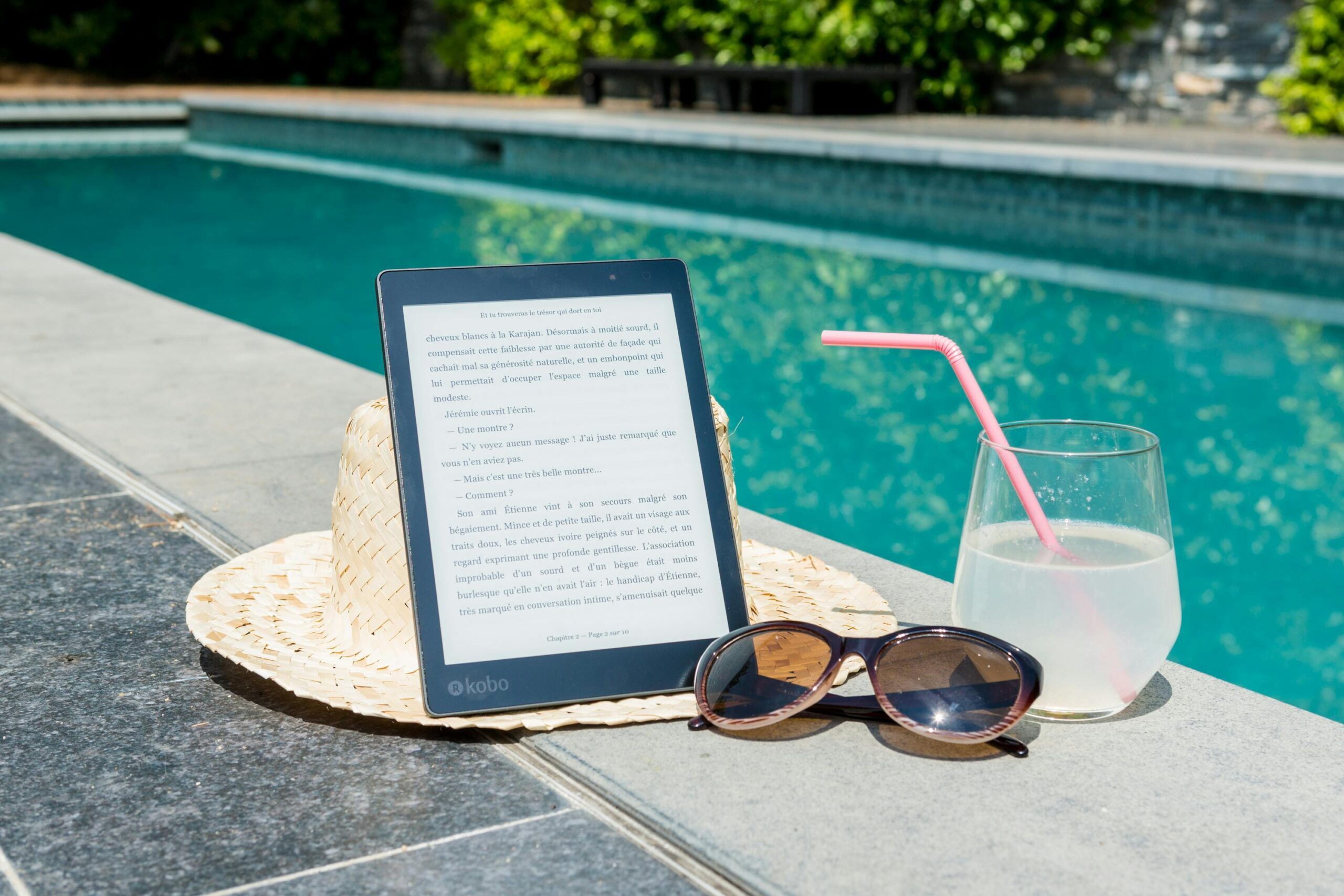 Kobo e-reader by pool