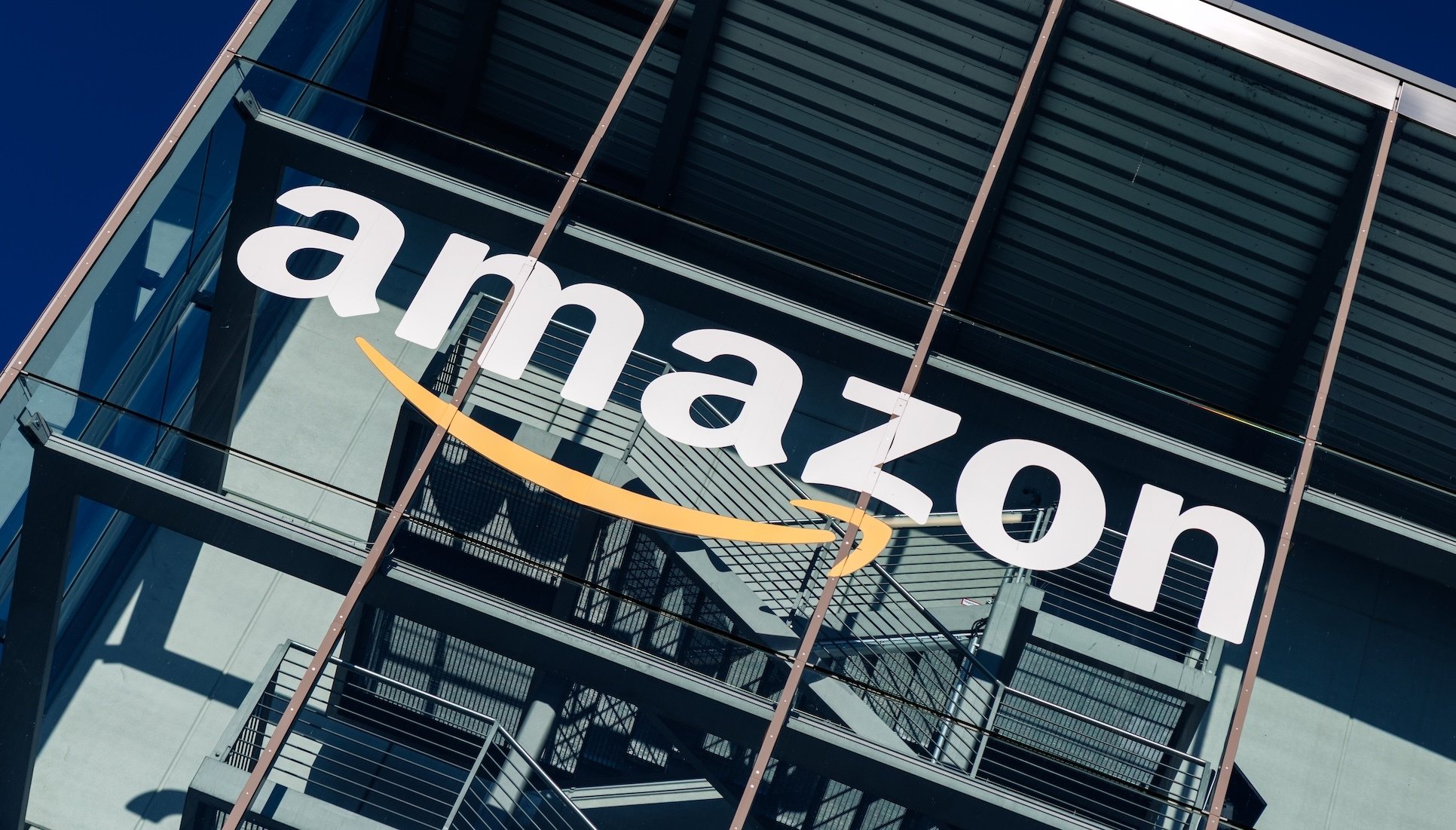 exterior of Amazon office building with giant logo