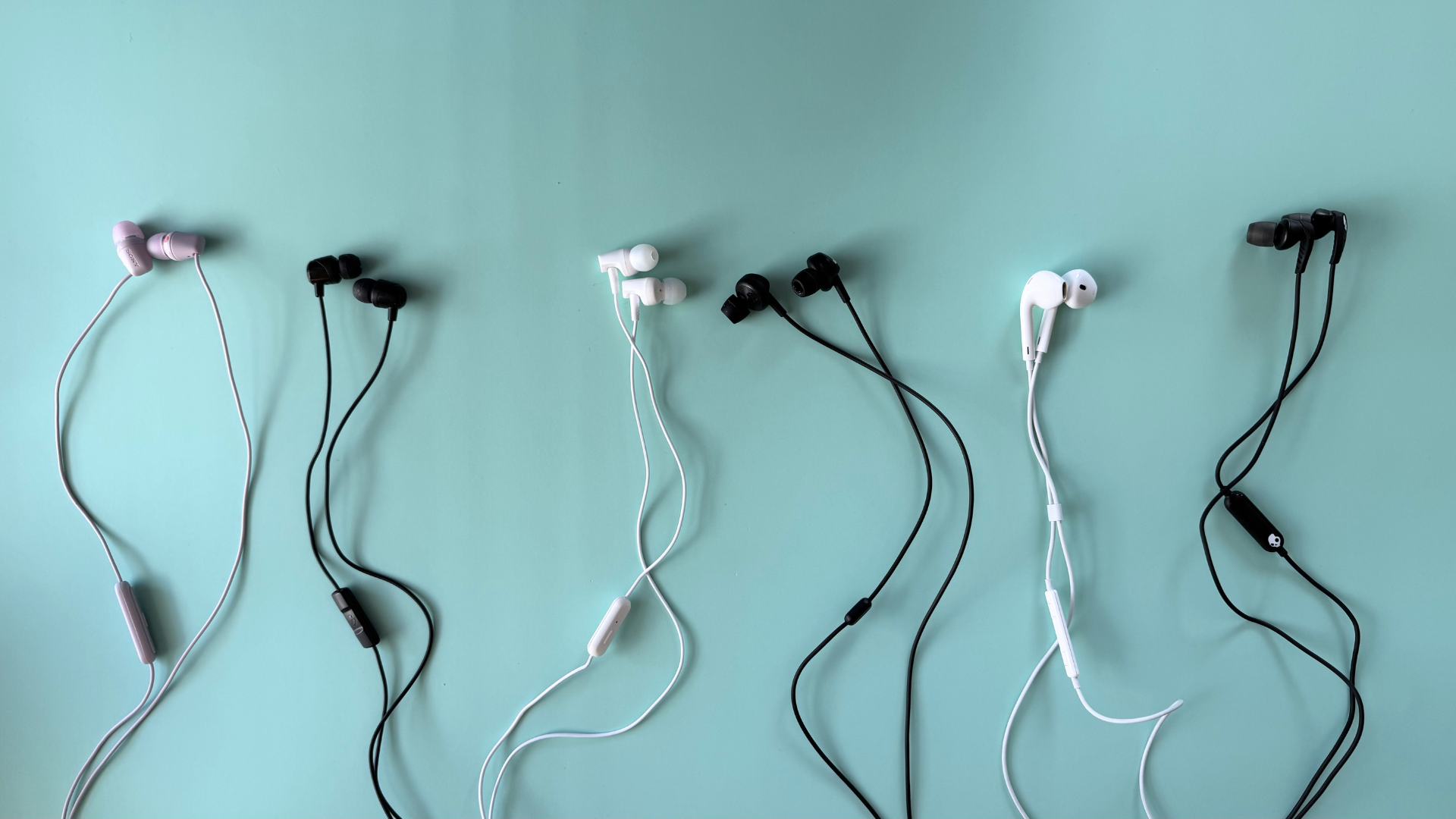 Earbuds on a blue background