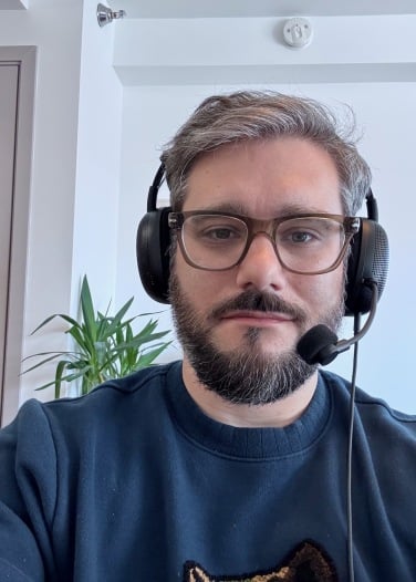 a man wearing sony h6 air gaming headset