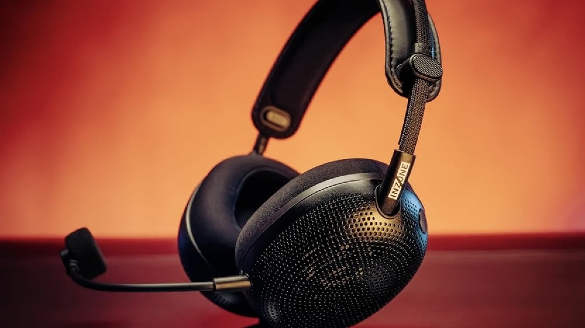 sony inzone h6 air headphones on red background