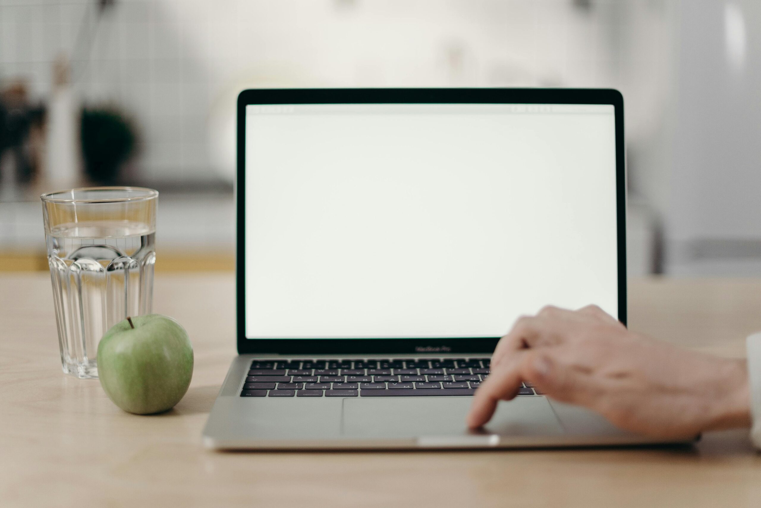 Finger on laptop