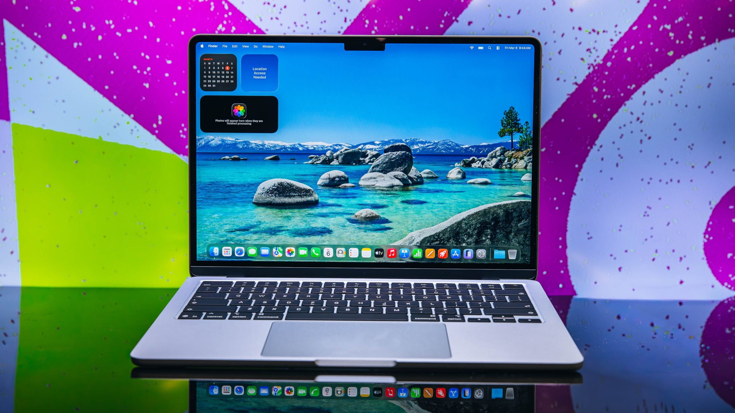 New MacBook M5 on glossy surface