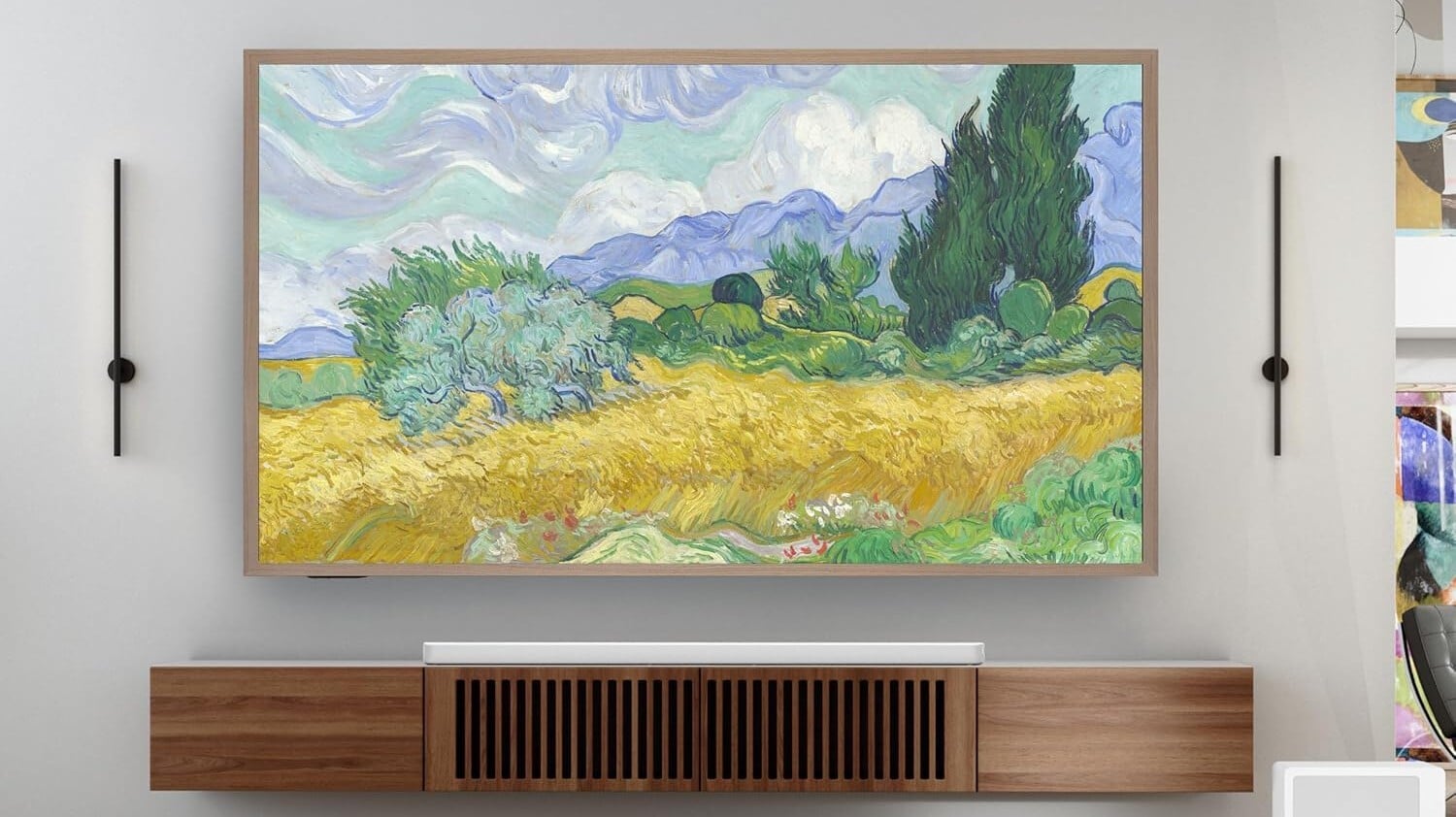 hisense canvas TV hangs in a living room displaying artwork from monet