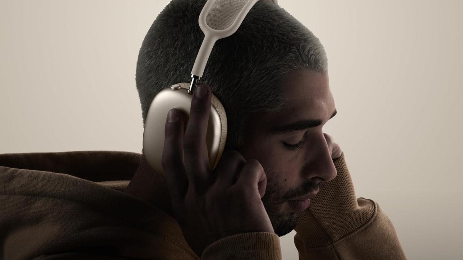 close up of man wearing apple airpods max 2