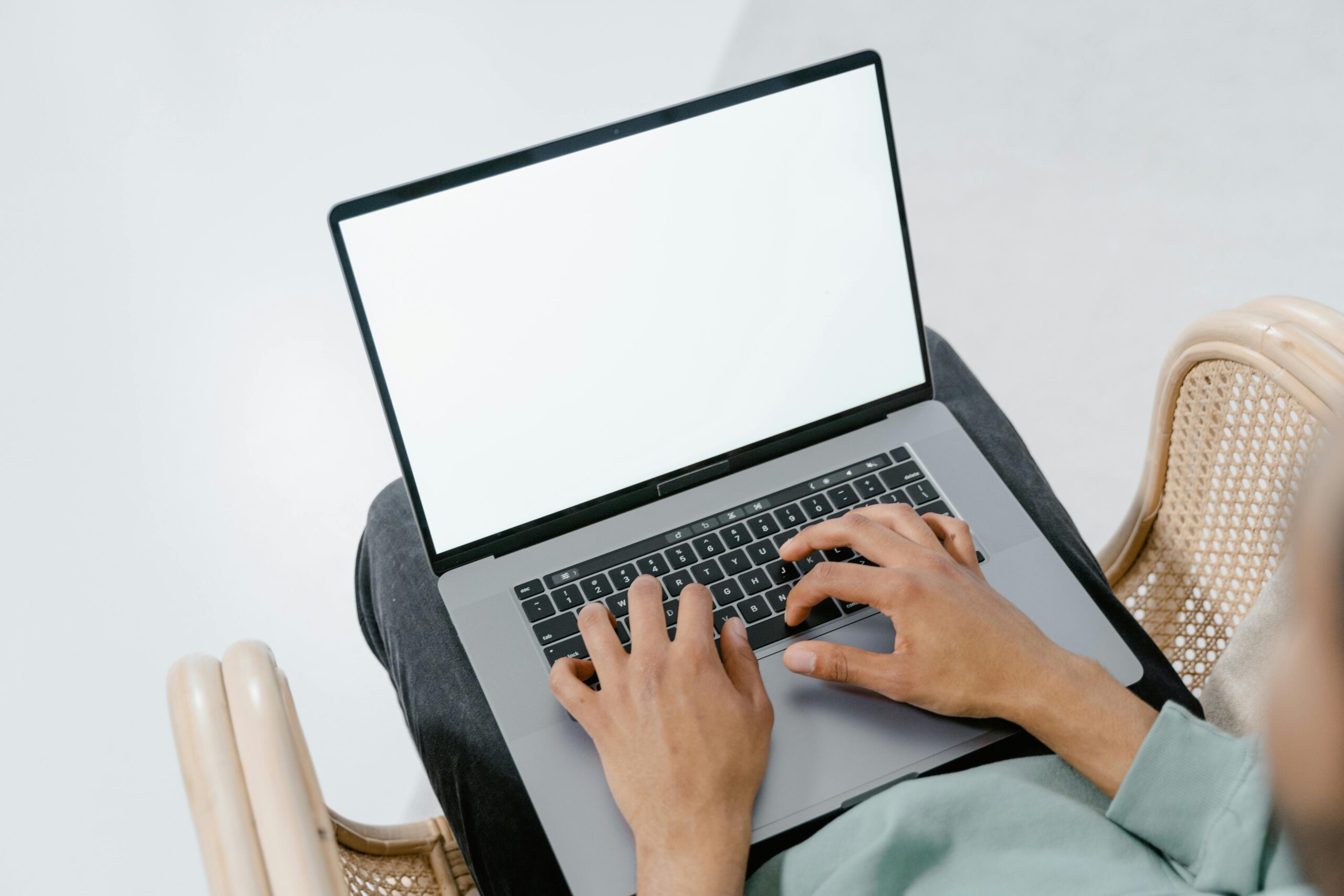 Fingers on laptop