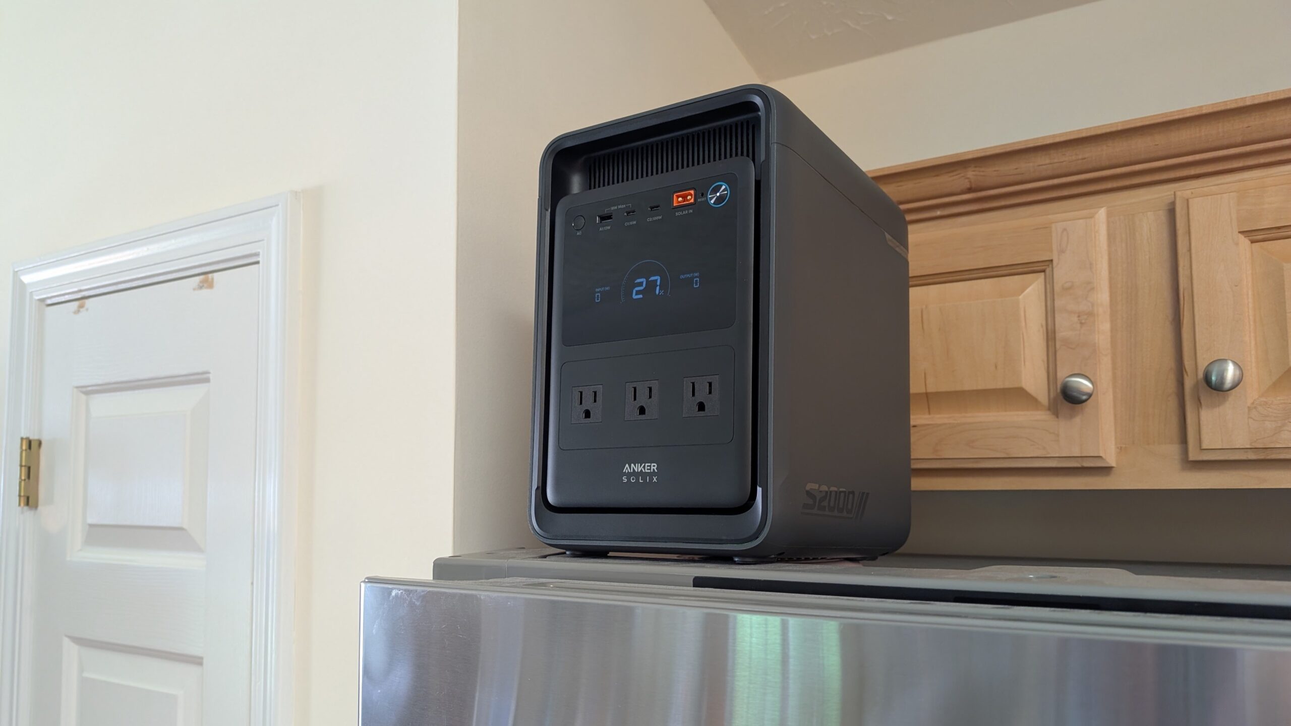 the anker solix s2000 on top of a refrigerator in a kitchen
