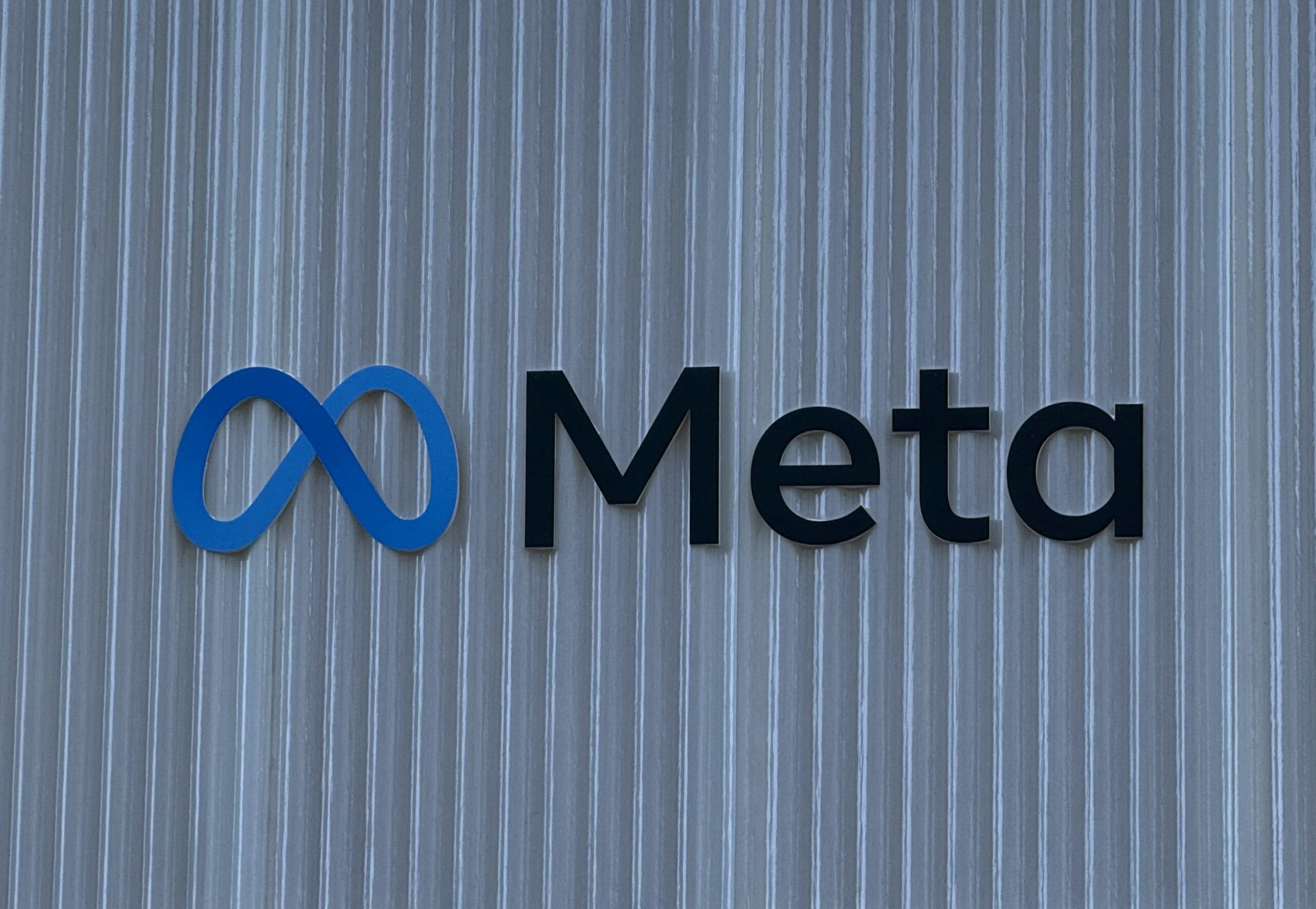 Meta logo on building