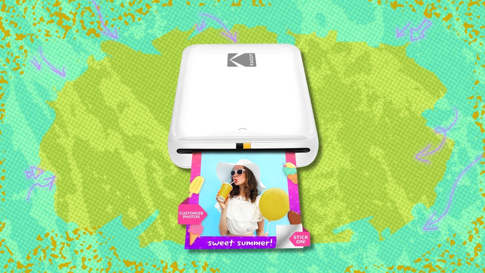 kodak step instant smartphone photo printer against a green patterned background