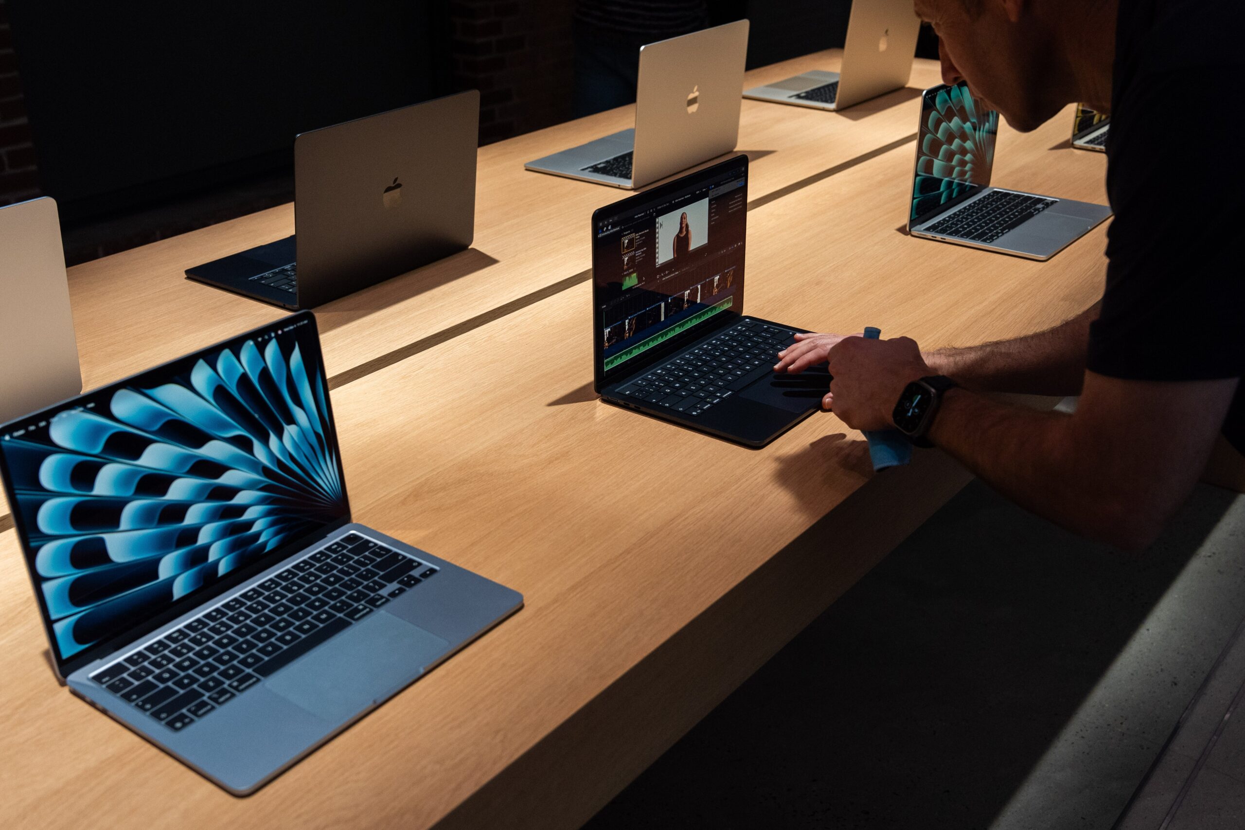 MacBook Pros on desk
