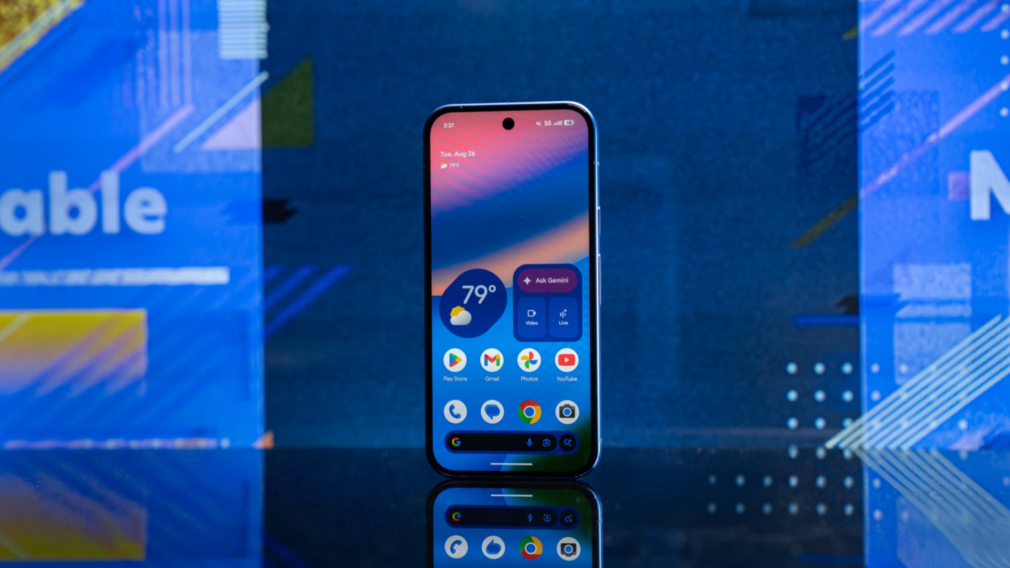 Google Pixel 10 in front of blue background