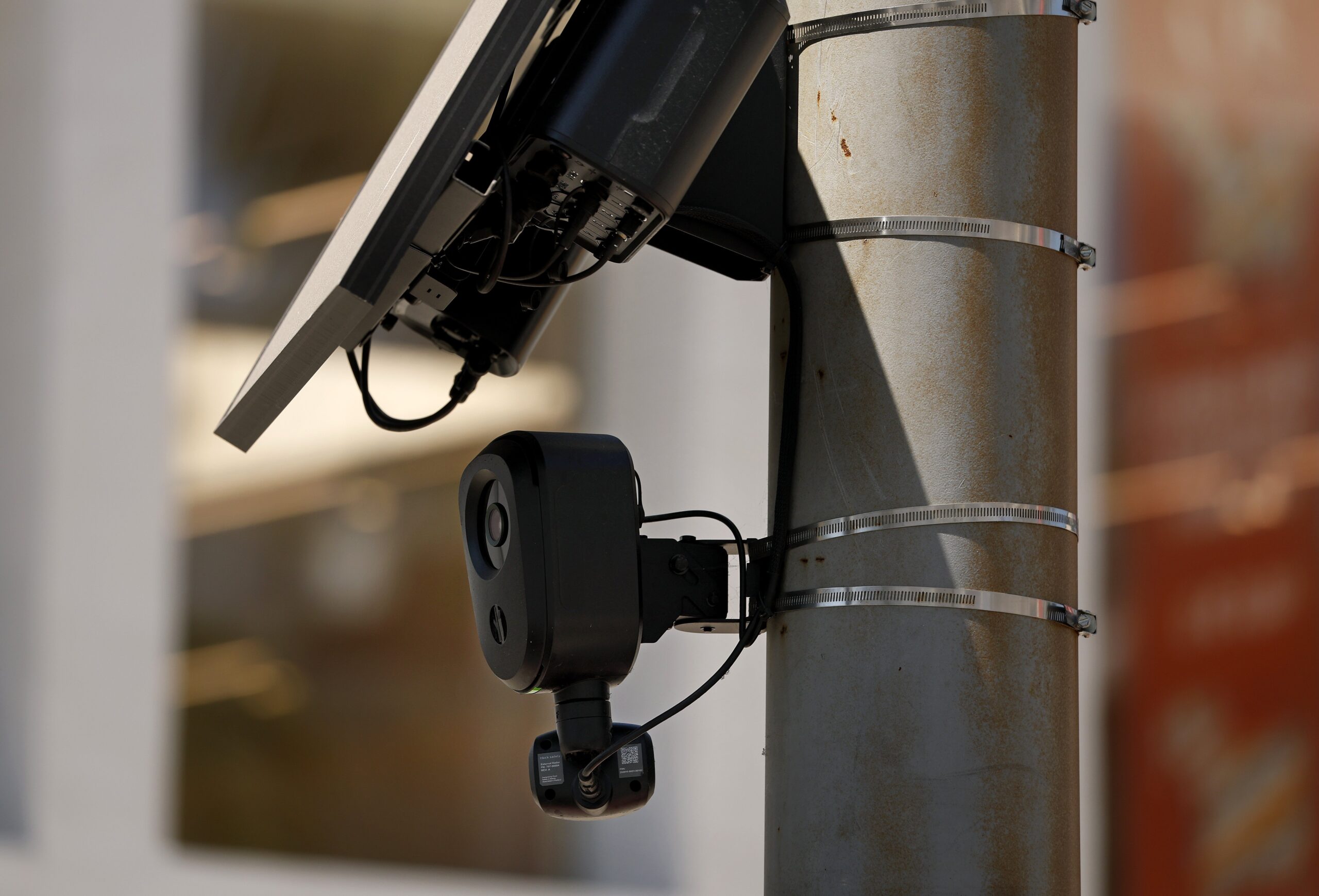 A Flock Safety camera is shown mounted to a light pole on August 03, 2026 in Beverly Hills, California.