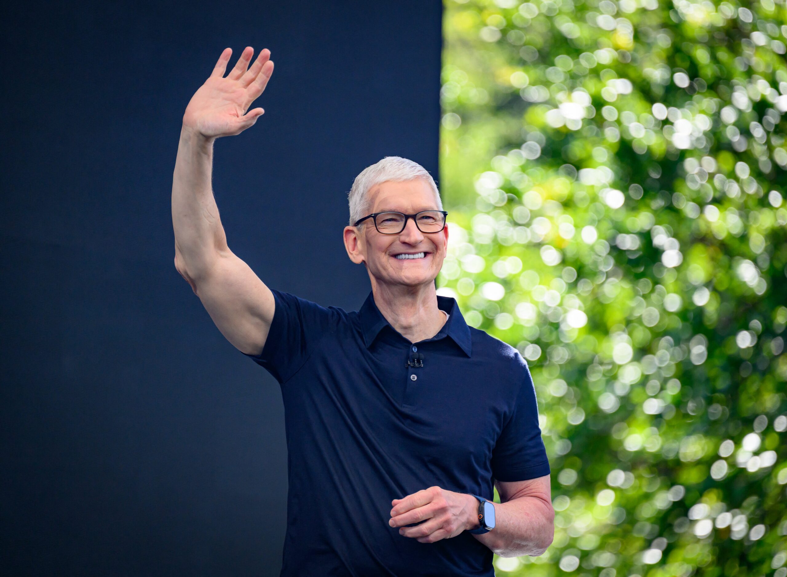 Tim Cook waves at WWDC 2026
