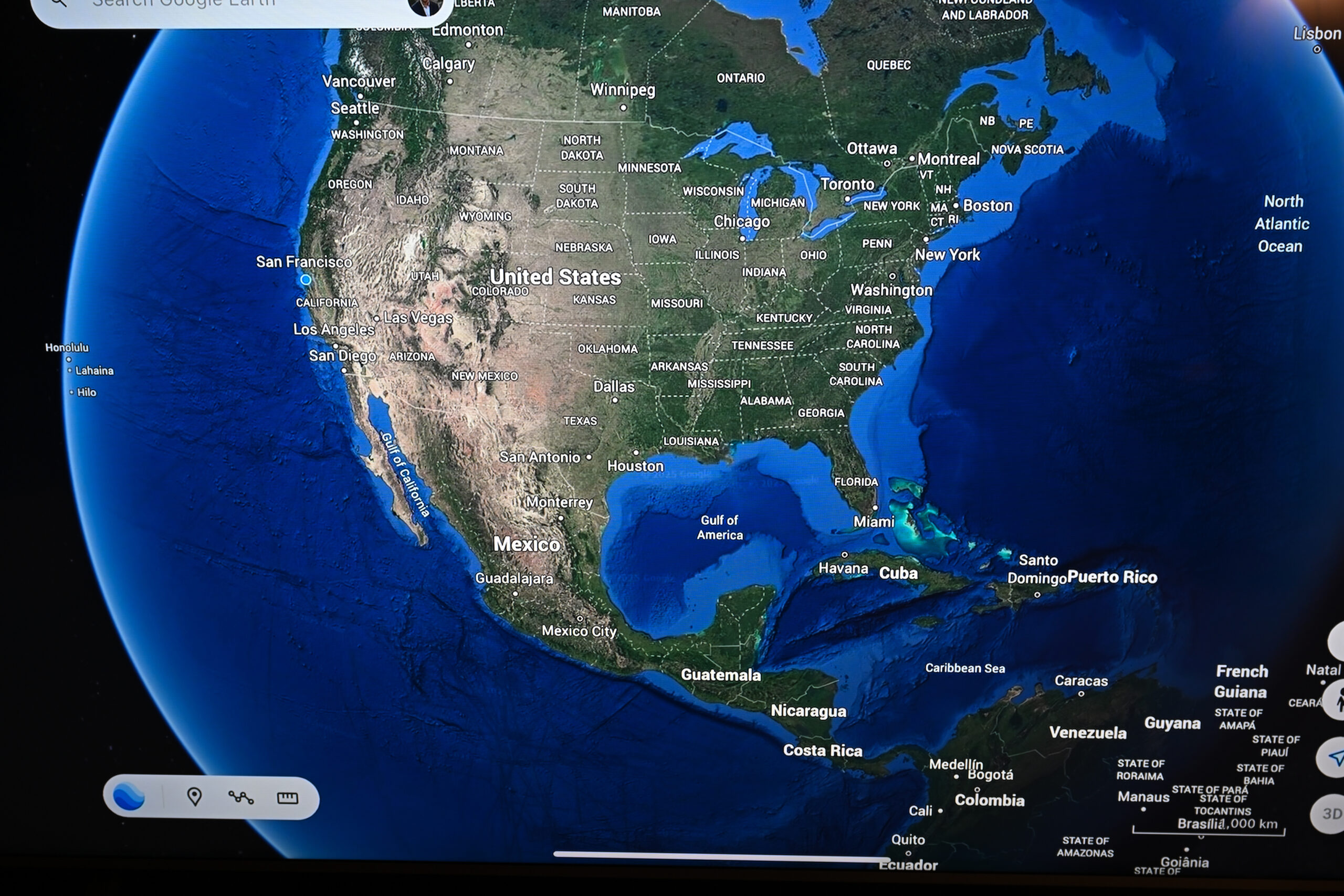 A giant monitor displays Google Earth that shows Gulf of America, in Mountain View, California, United States on February 12, 2025