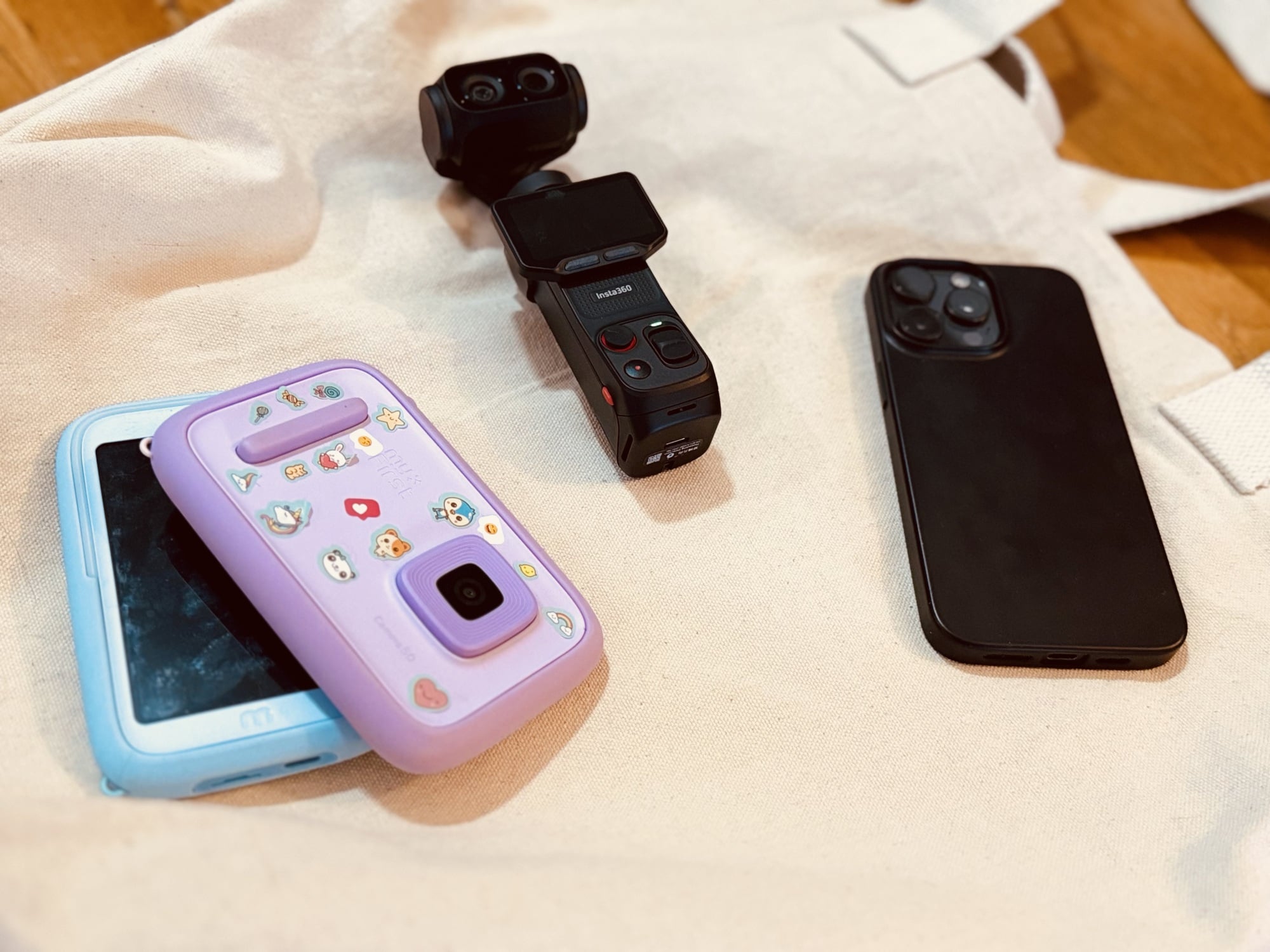 From left to right: MyFirst Camera 50, Insta360 Luna Ultra, iPhone 15 Pro Max