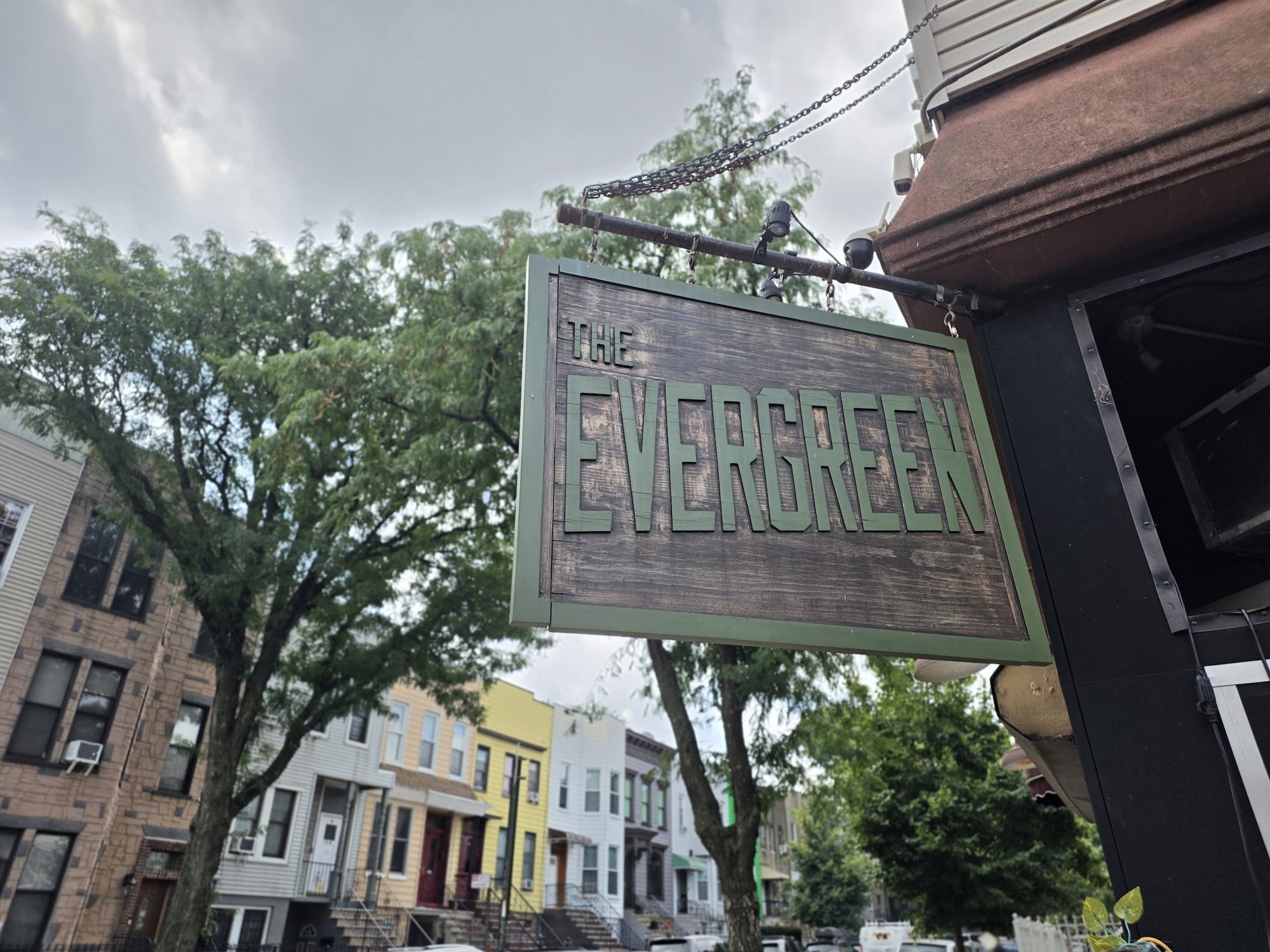 A bar sign reading "The Evergreen"