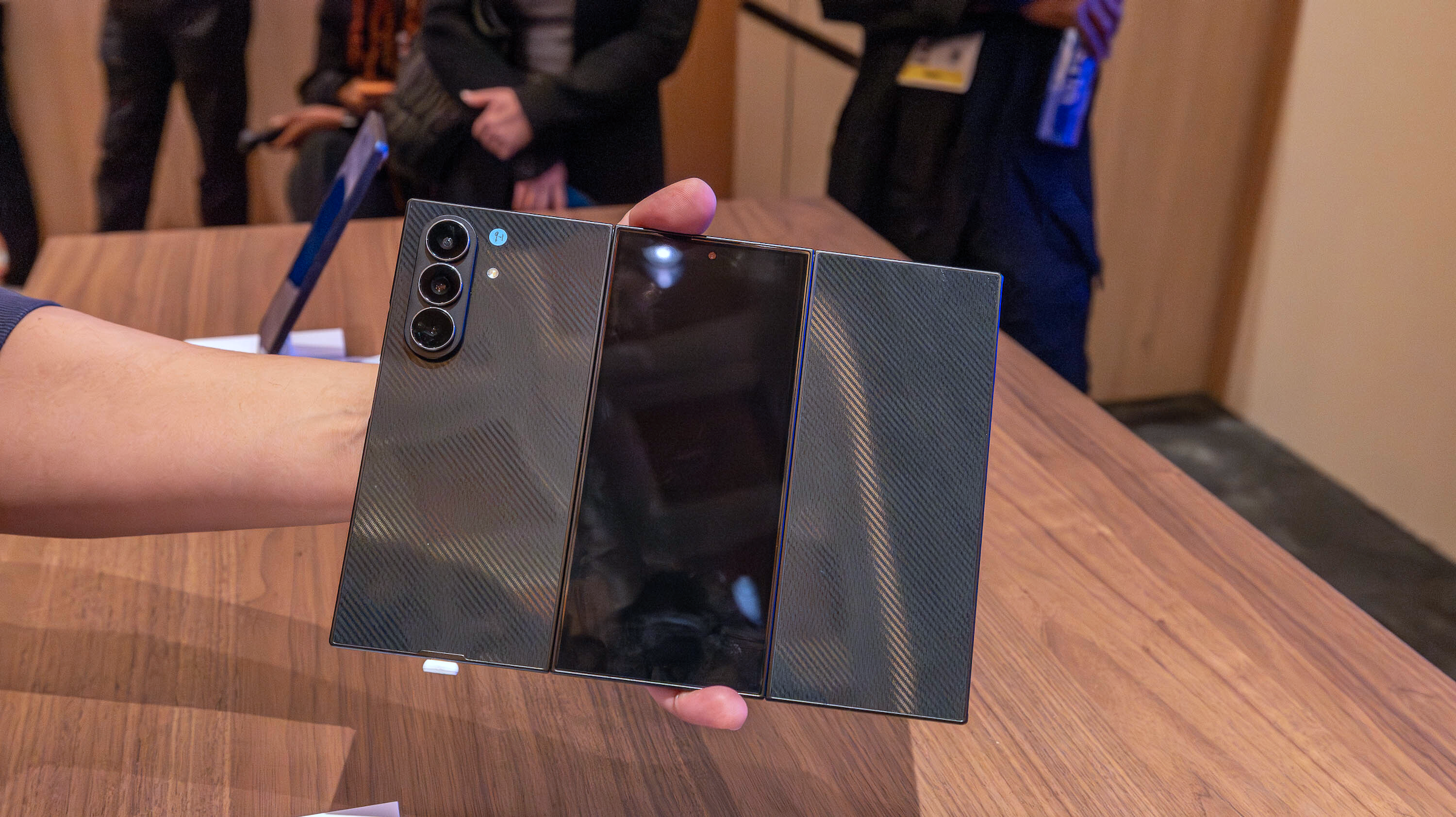 A close up of the back of a Samsung Galaxy Z Tri-Fold phone