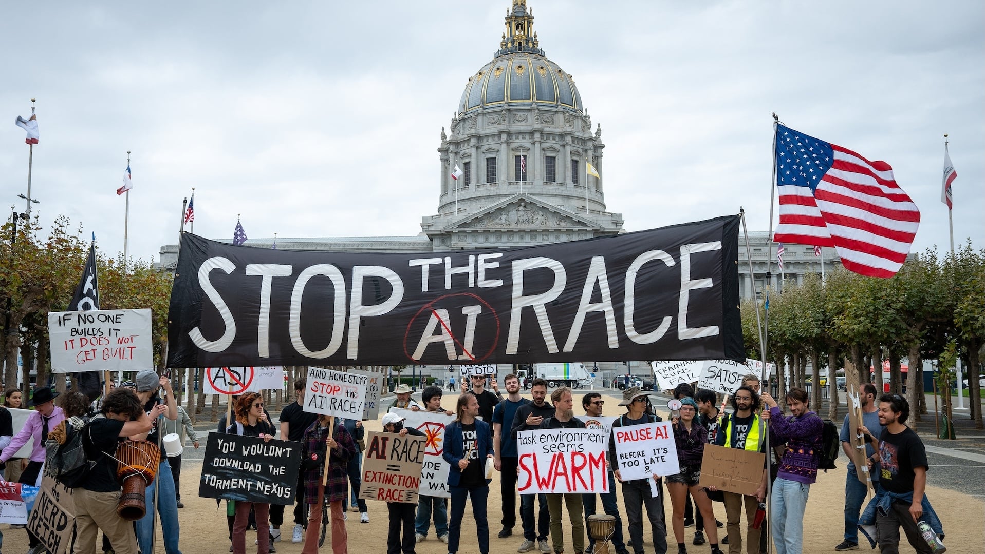 A group of anti-AI demonstrators outside a government building in San Francisco.