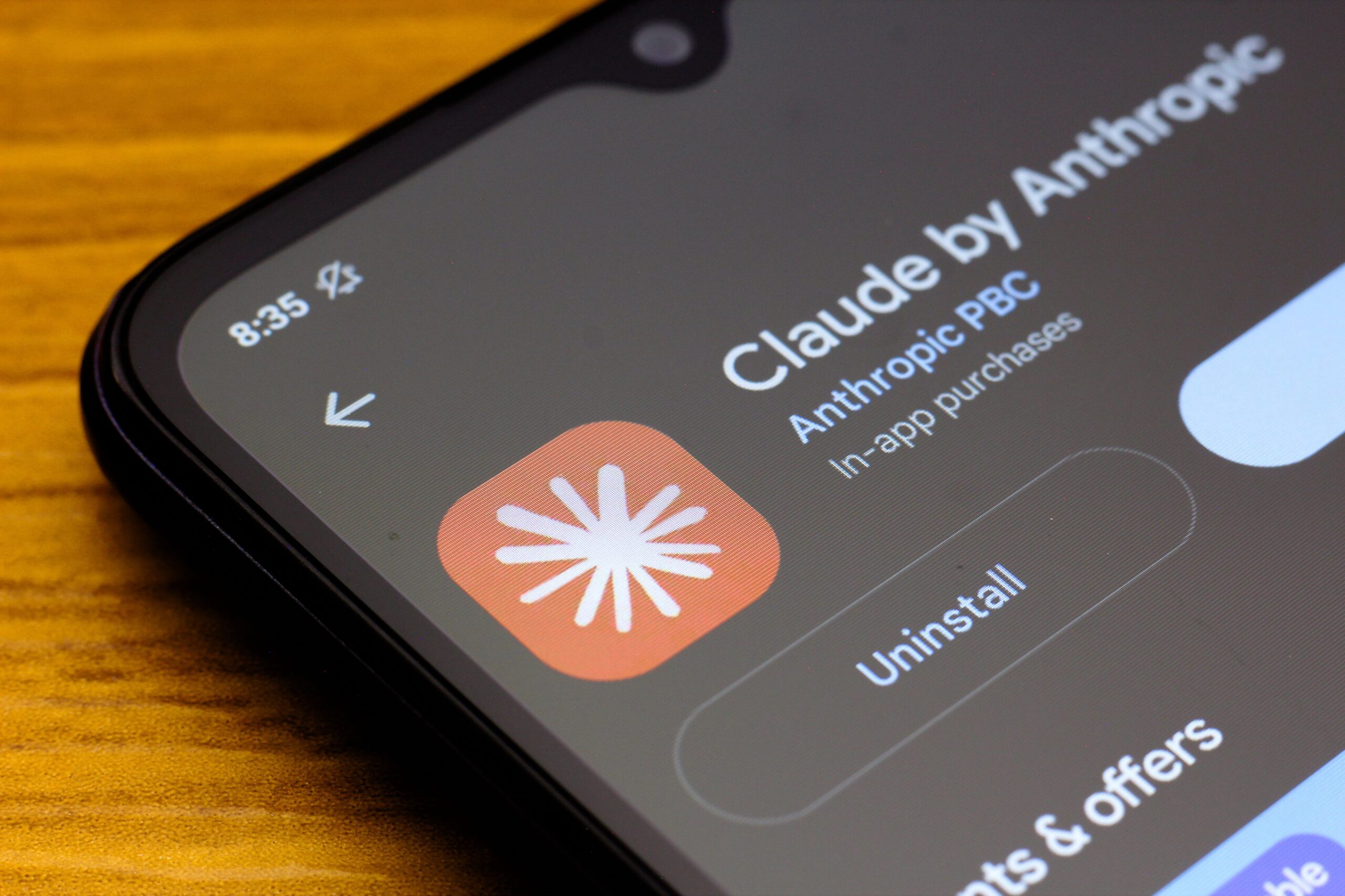the Claude by Anthropic logo is seen displayed on a smartphone screen