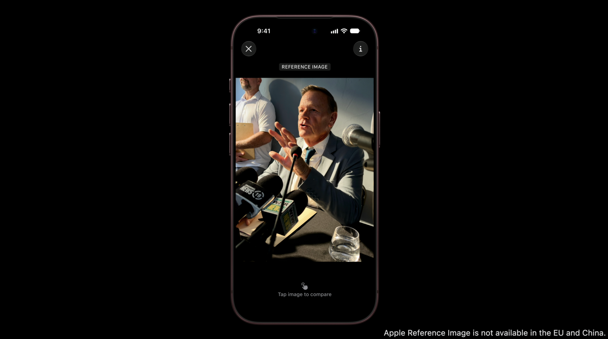 man having his photo taken from the perspective of the iphone camera