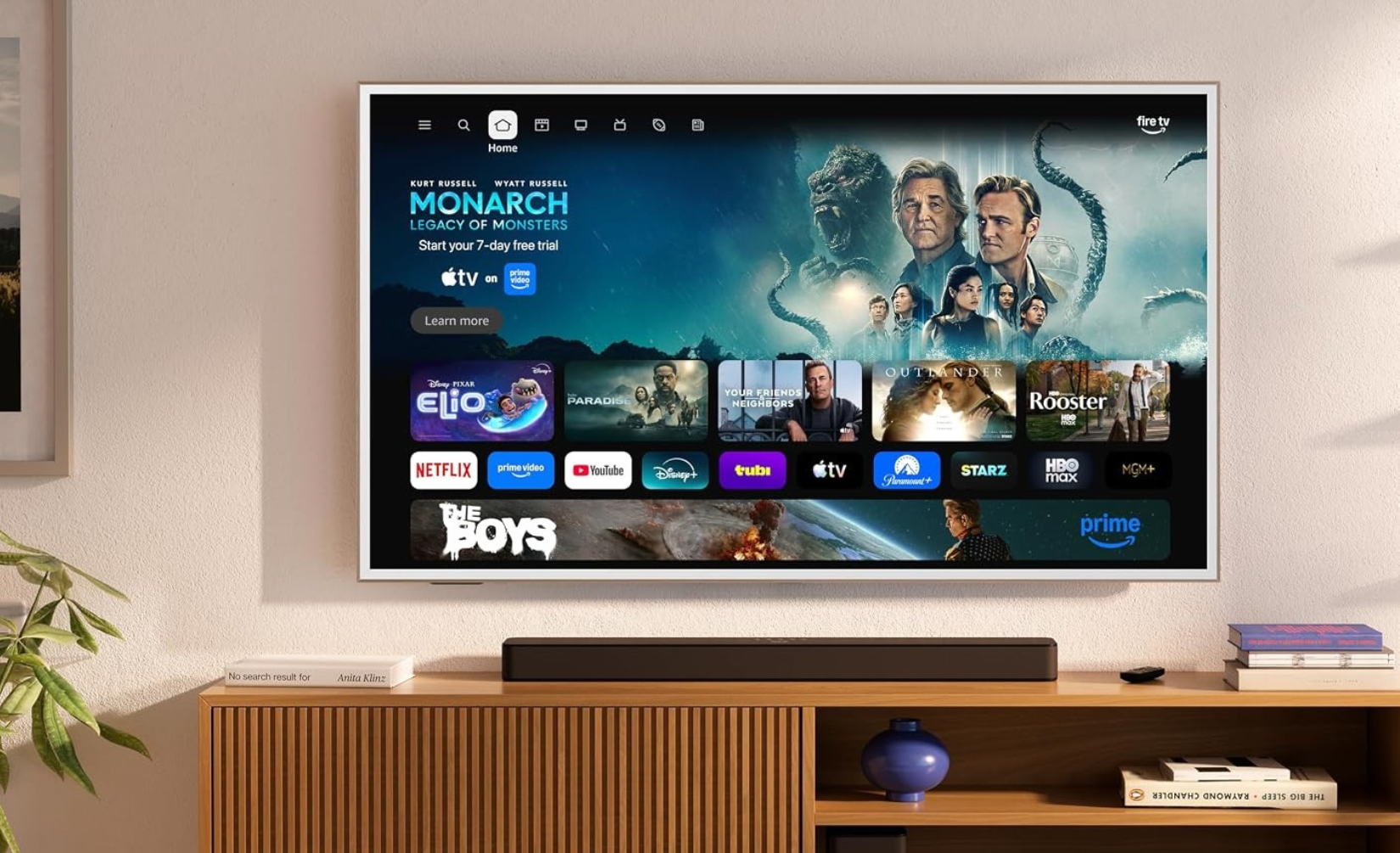 Toshiba artvision tv mounted on a living room wall. 