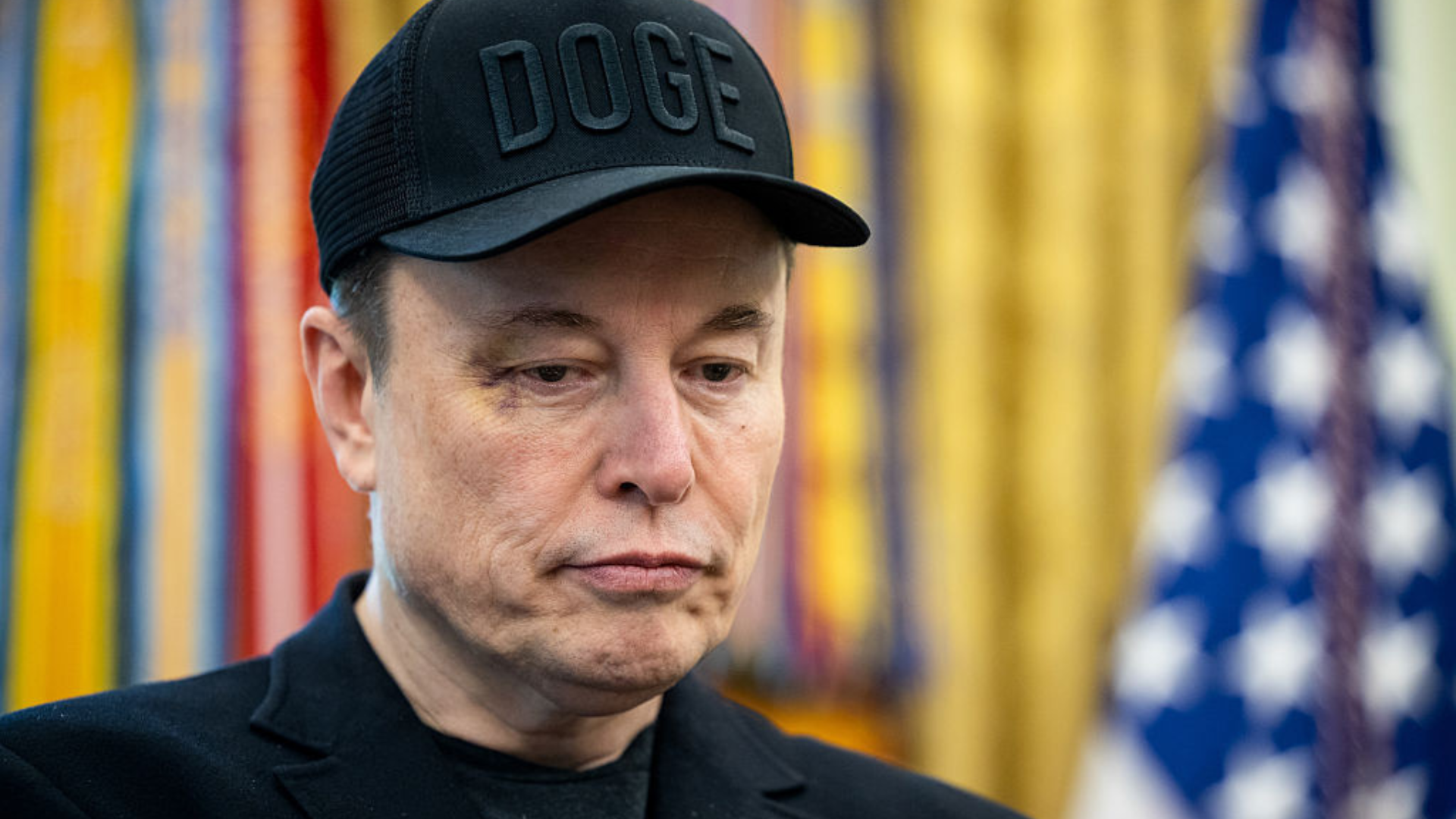 Elon Musk wearing a DOGE cap in the Oval Office of the White House in Washington, DC, US, on Friday, May 30, 2025.
