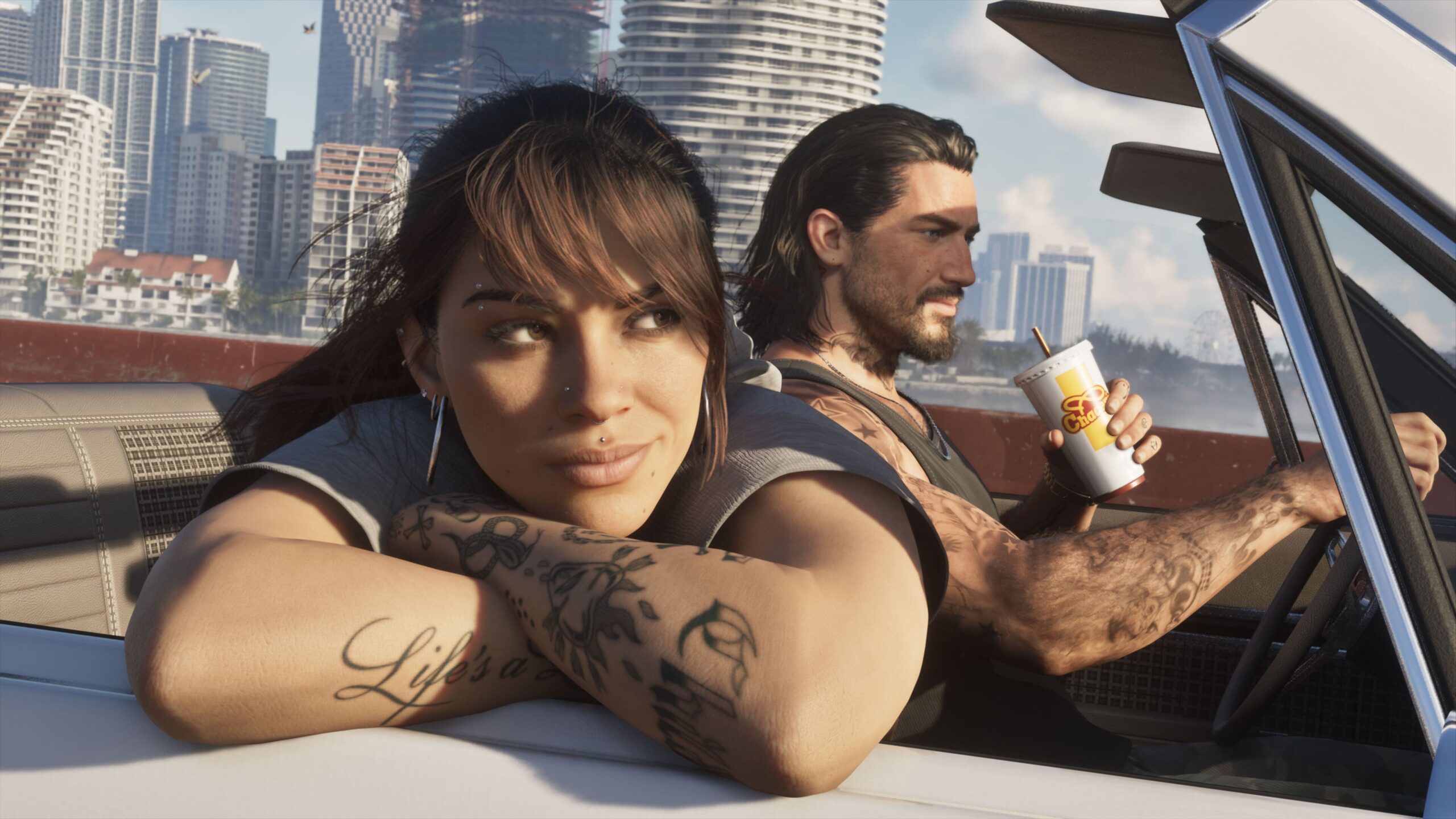 jason and lucia from grand theft auto vi ride in a car