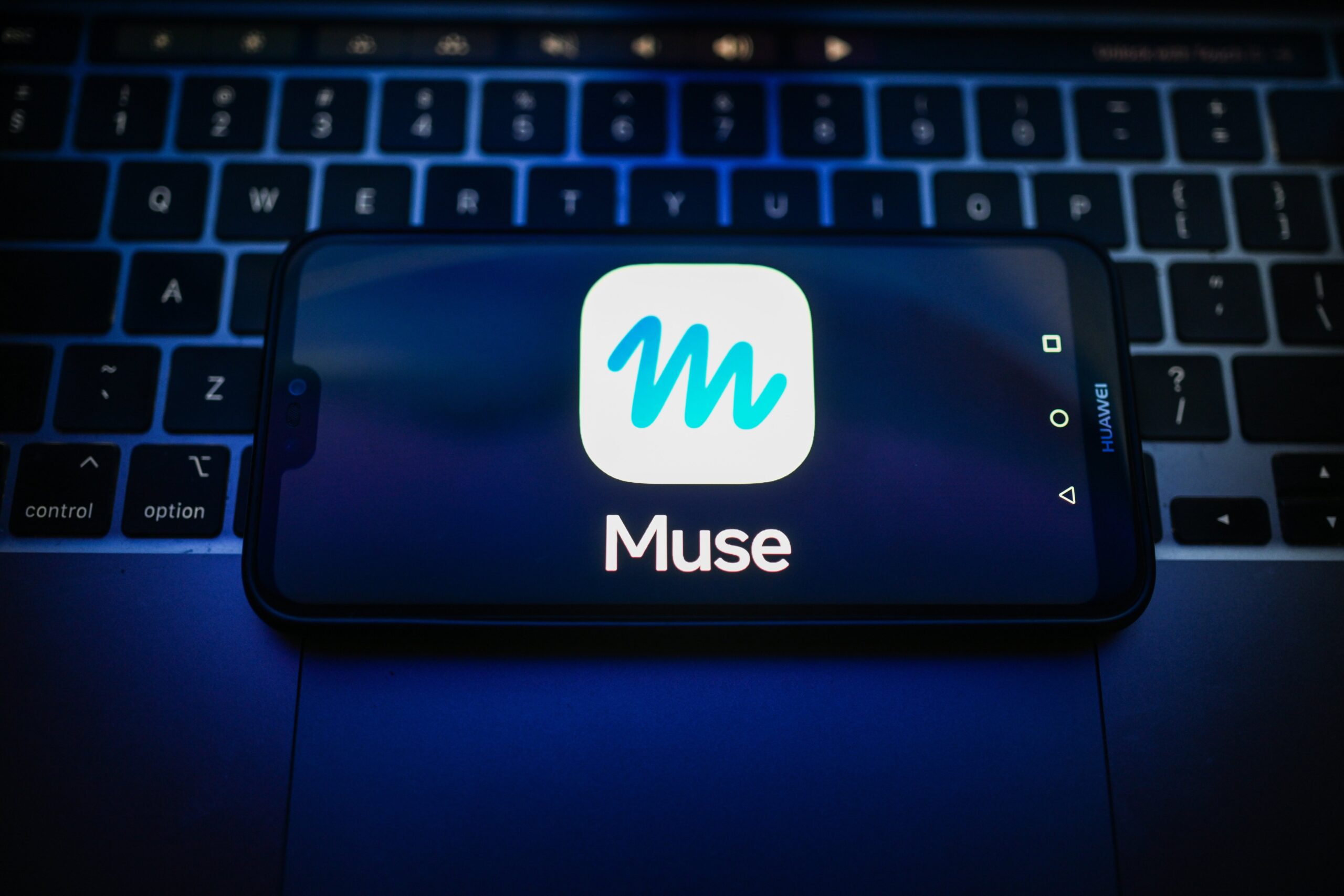 In this photo illustration, a Meta Muse logo is seen displayed on a smartphone on the top of a laptop. (Photo Illustration by Omar Marques/SOPA Images/LightRocket via Getty Images)