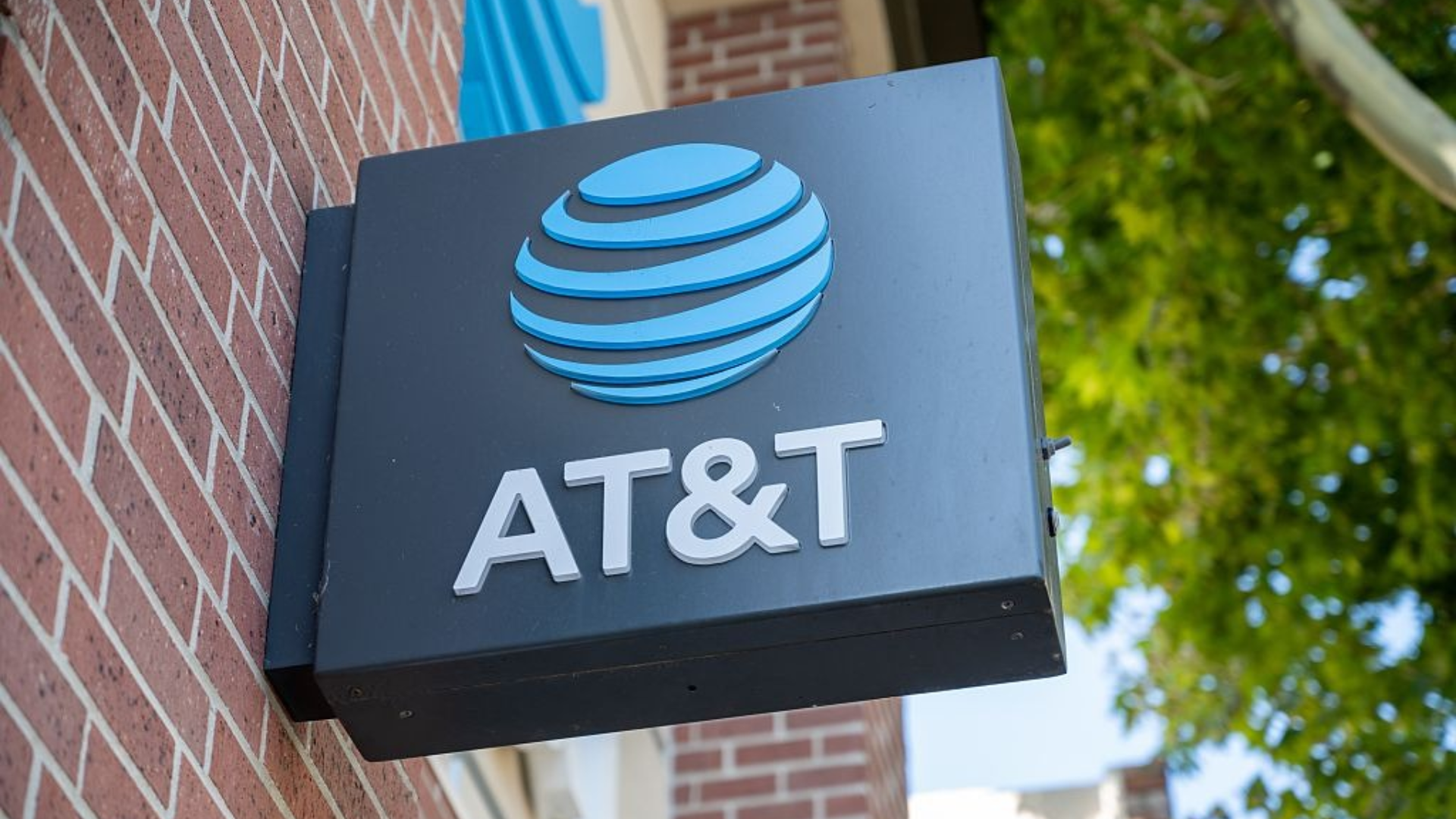 Sign with logo on facade of AT&T retail store, Walnut Creek, California, August 25, 2025.