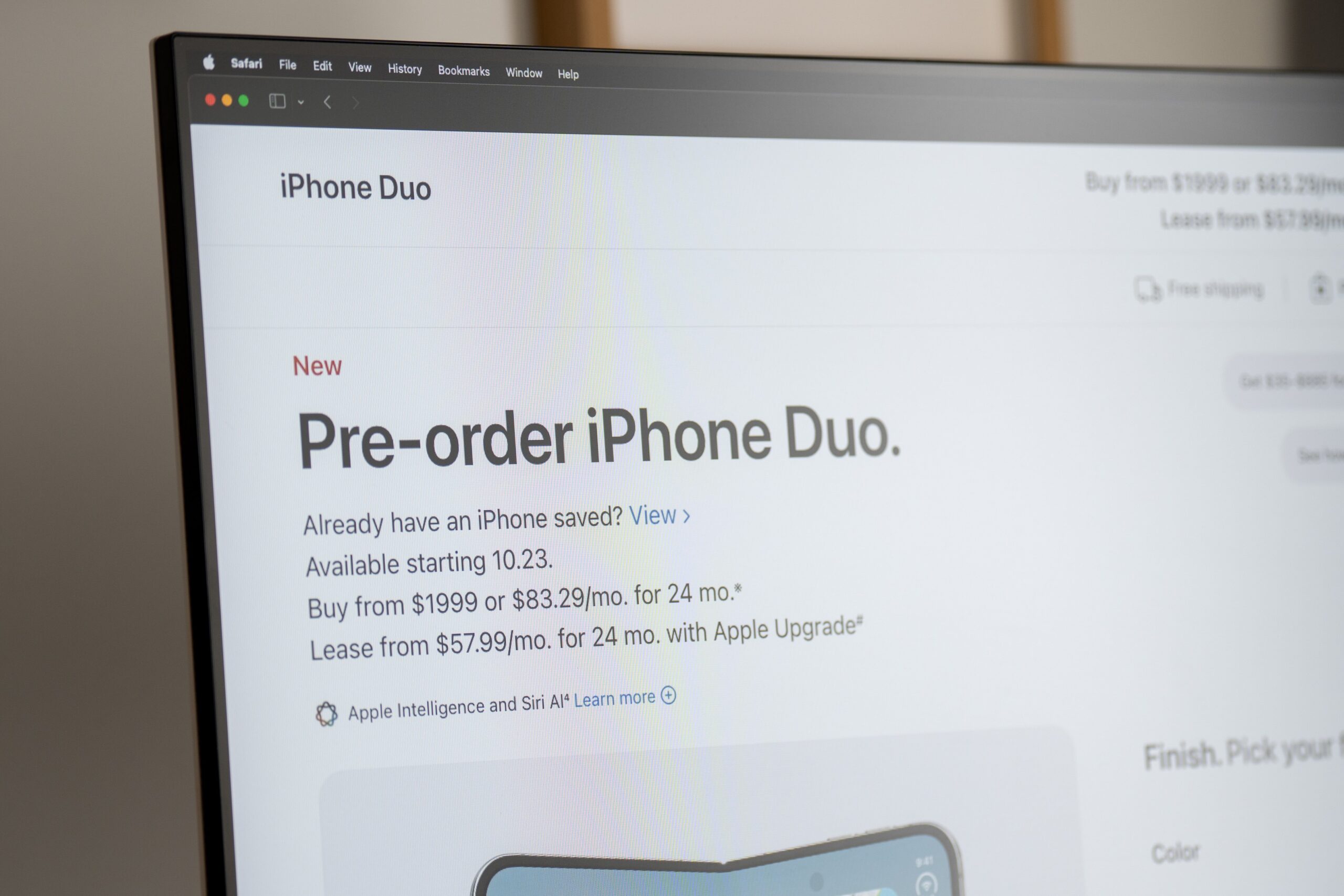 A computer screen displays the Apple Store website with the iPhone Duo pre-order page