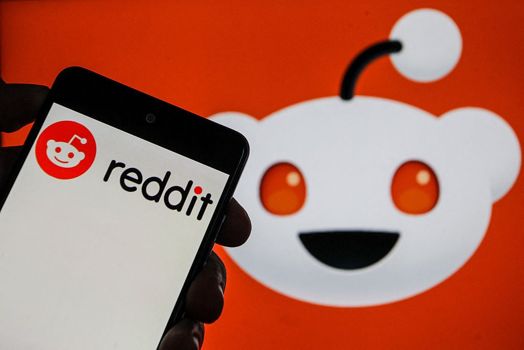 Reddit logo on phone screen