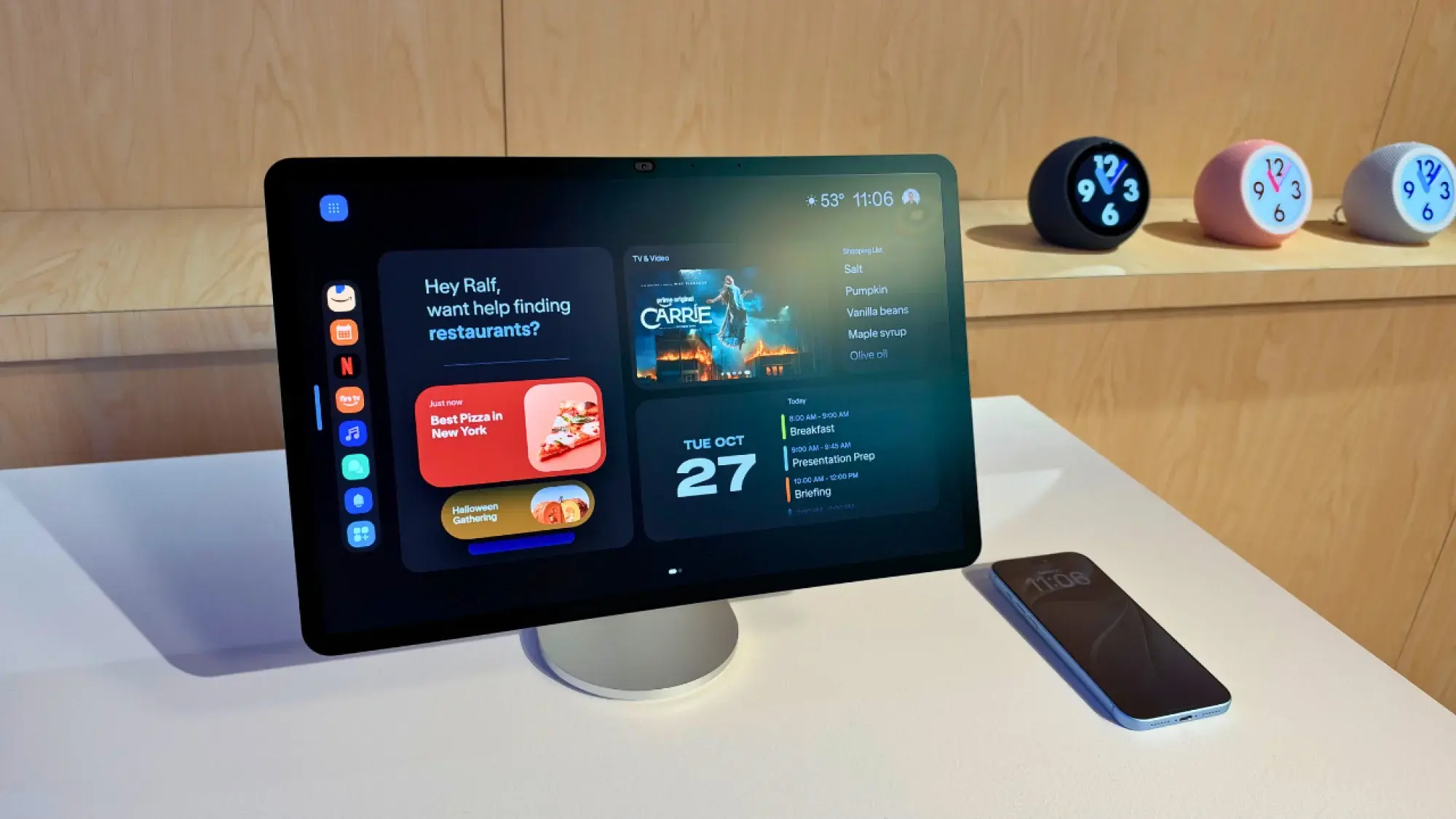 The Echo Show 16 sitting on a white table.