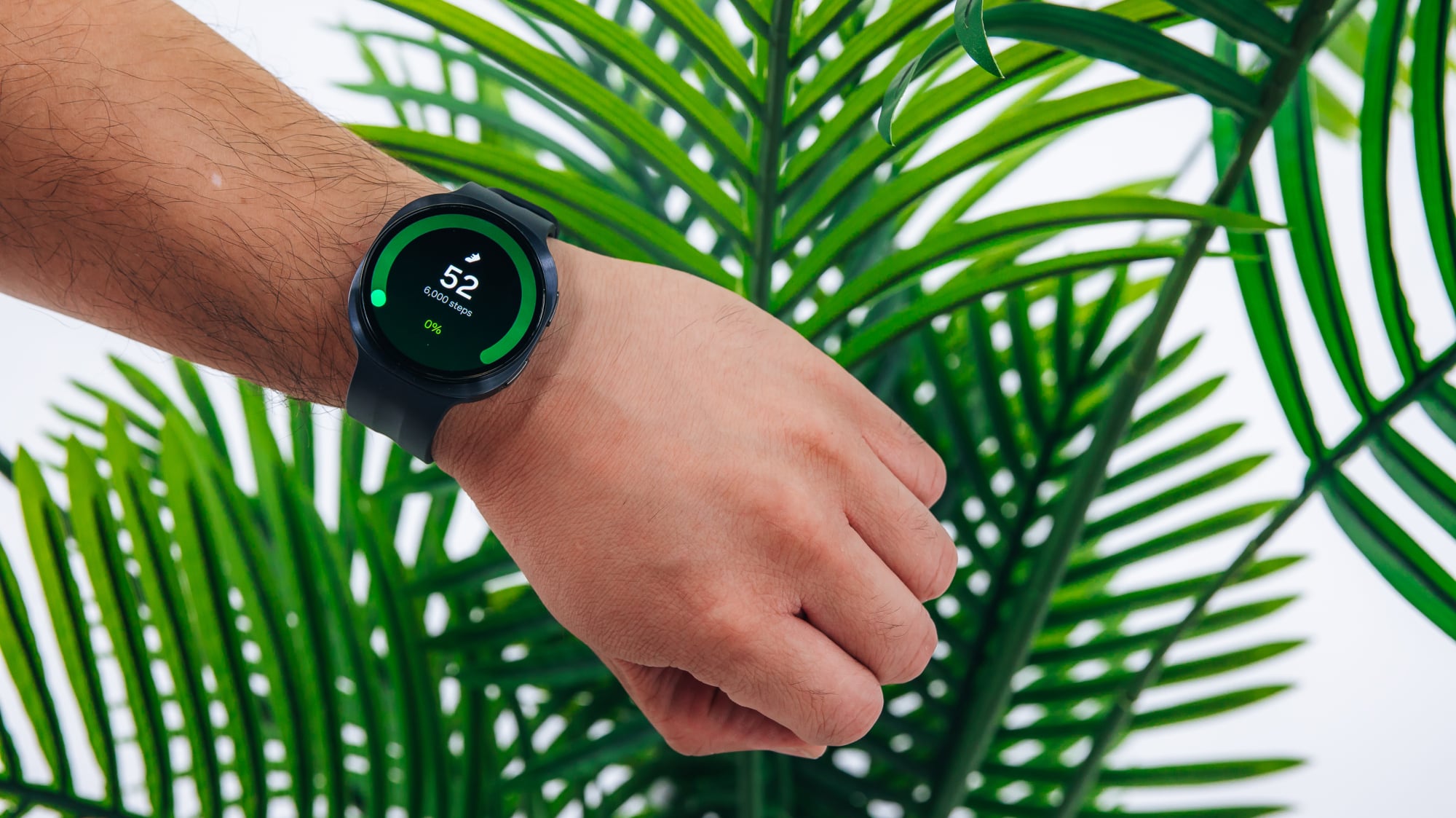 the samsung galaxy watch 9 on a person's wrist